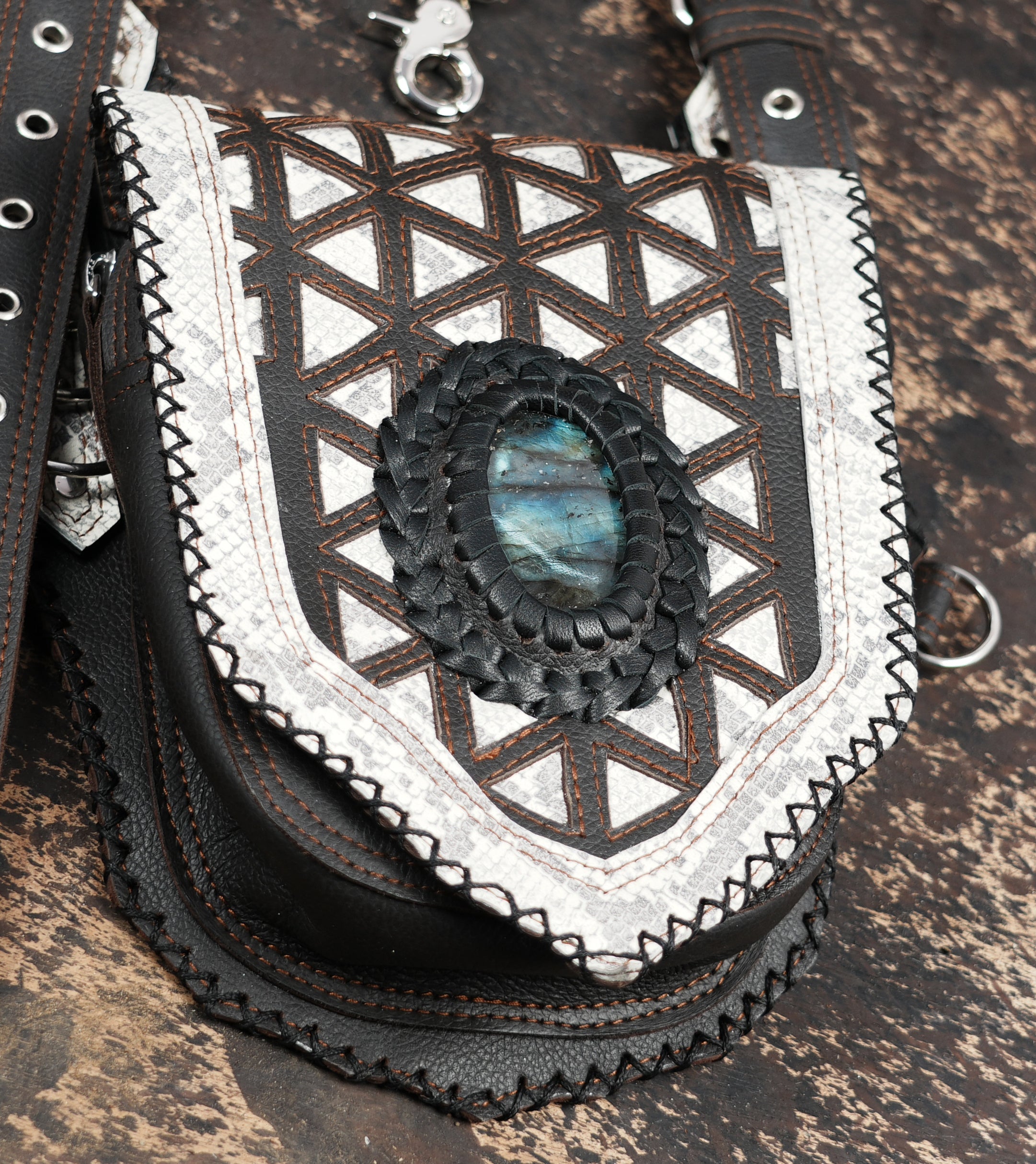 Adjustable leather shoulder holster with spiritual Om emblem