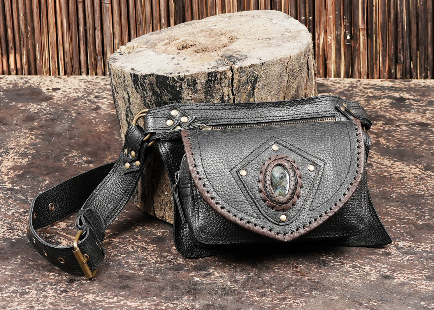 Black leather hip pouch with adjustable buckle strap