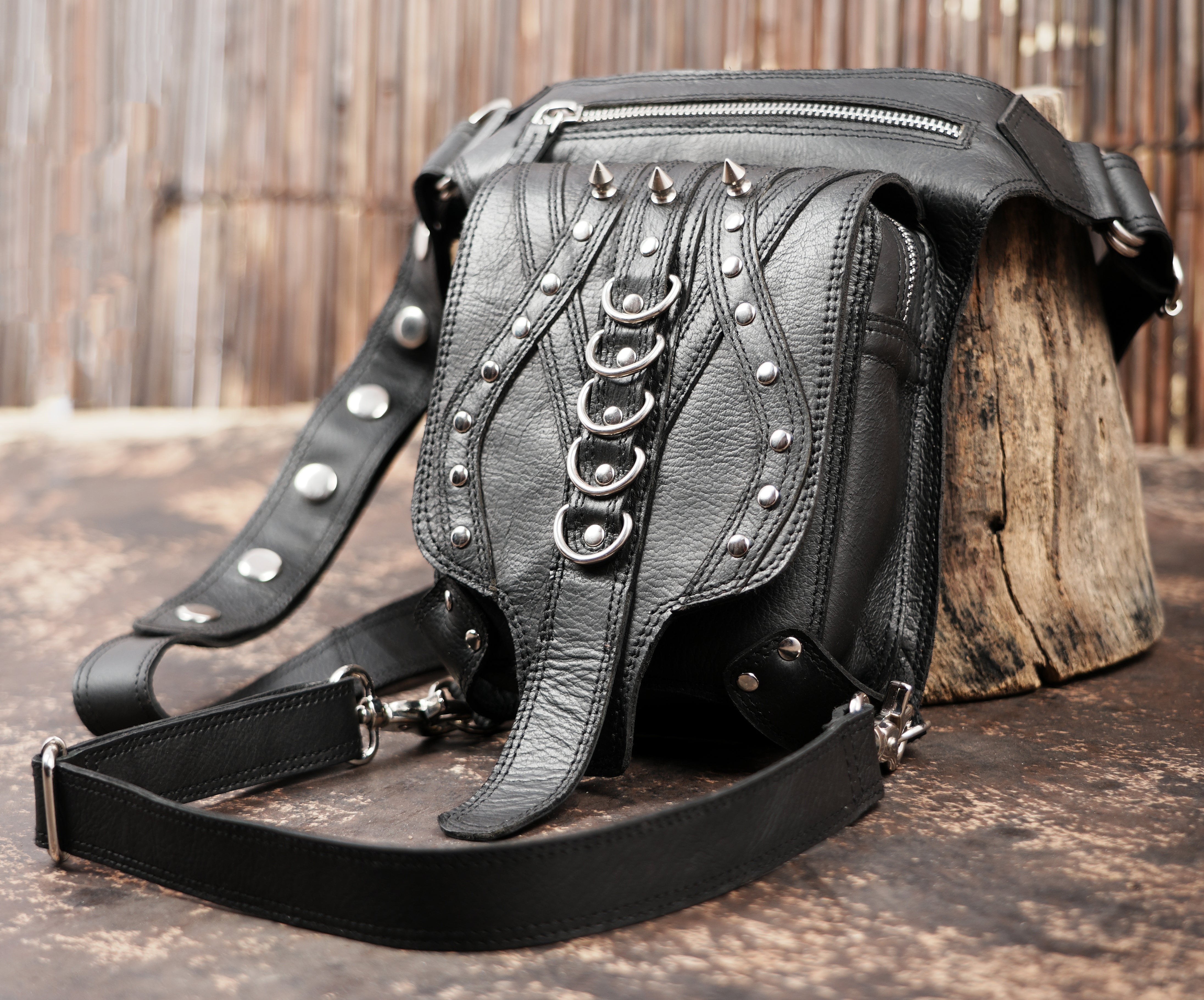 Handcrafted leather waist thigh bag with metal rings