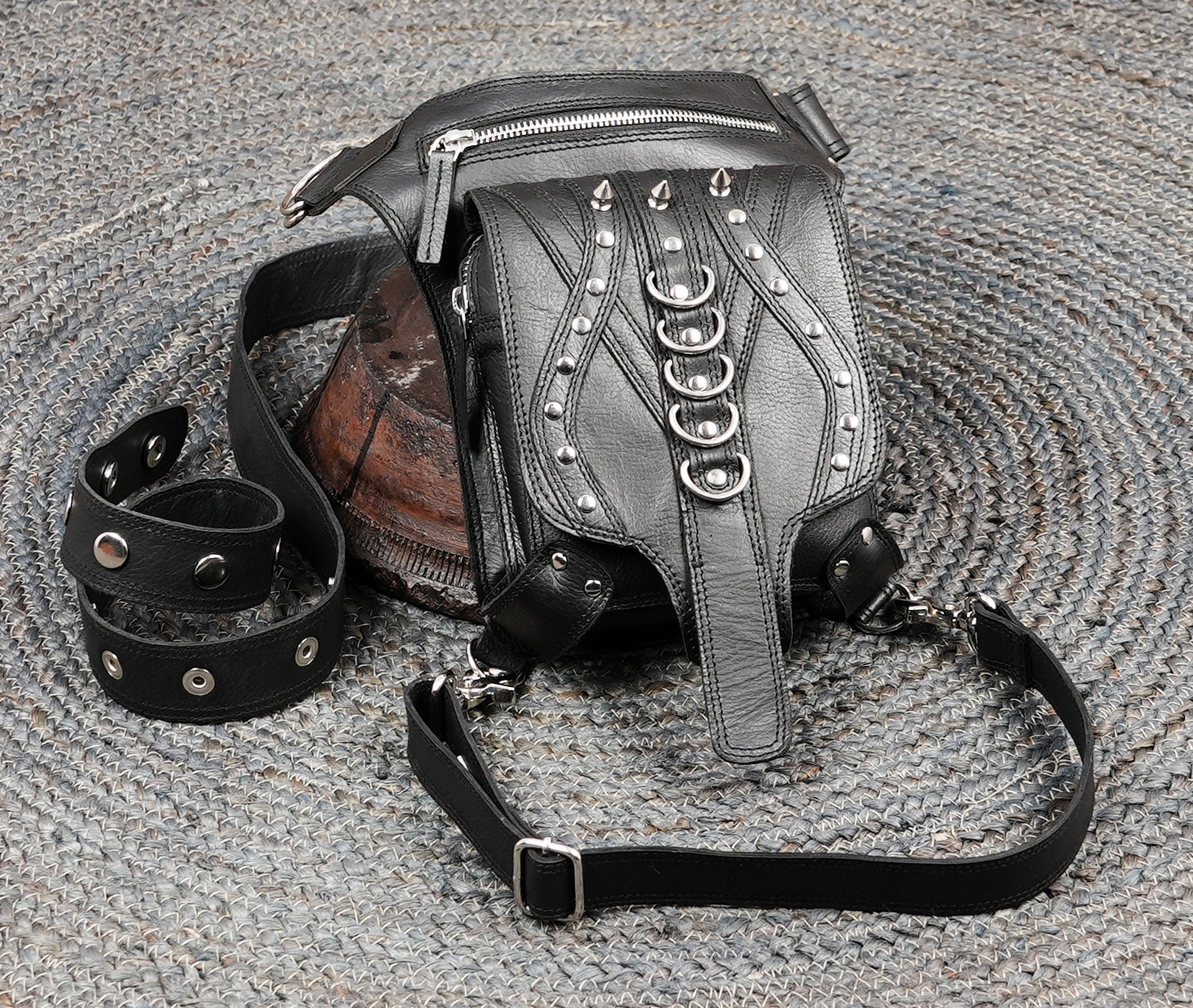 Durable leather thigh pouch with adjustable fit