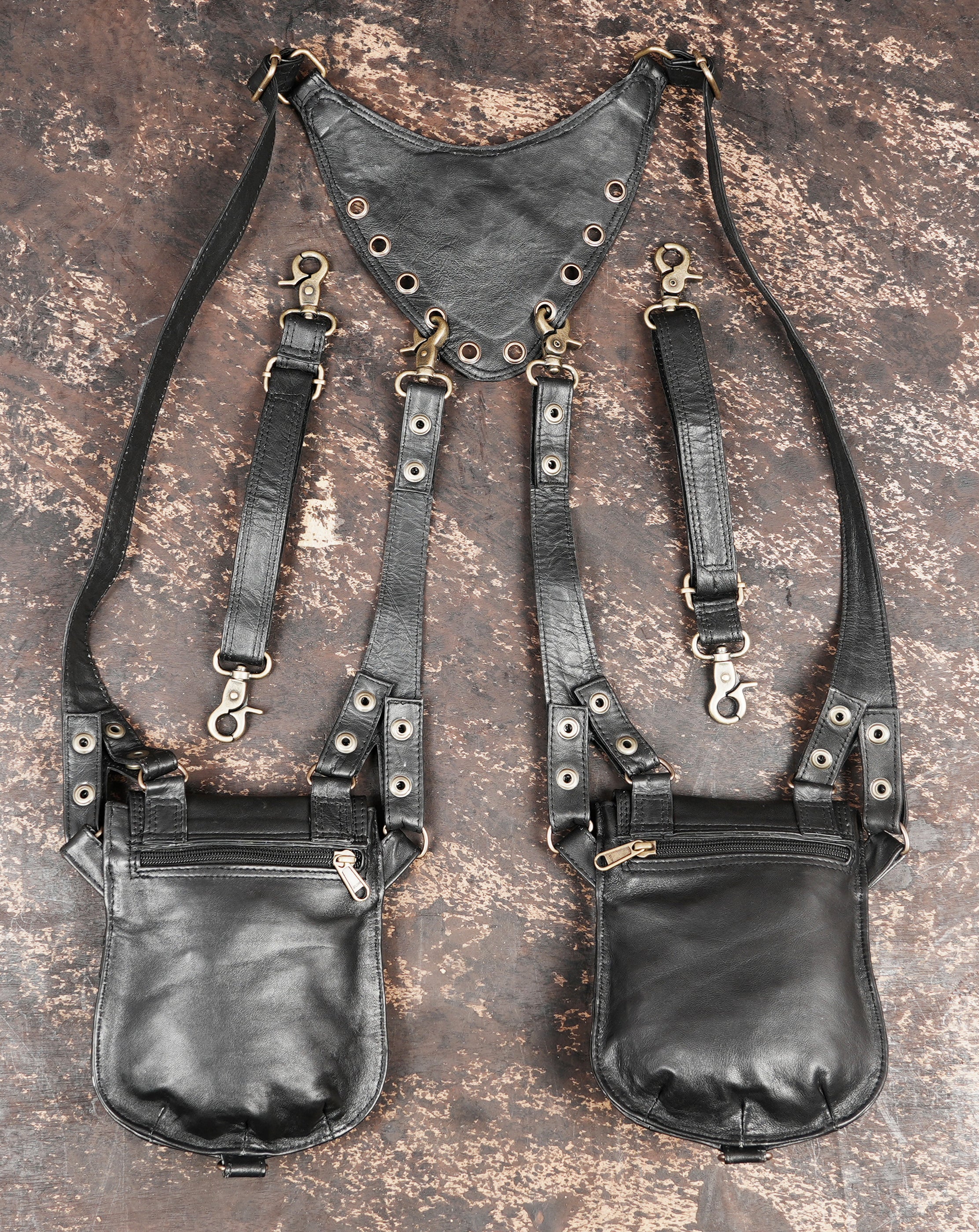 Leather utility shoulder holster with secure snap closures