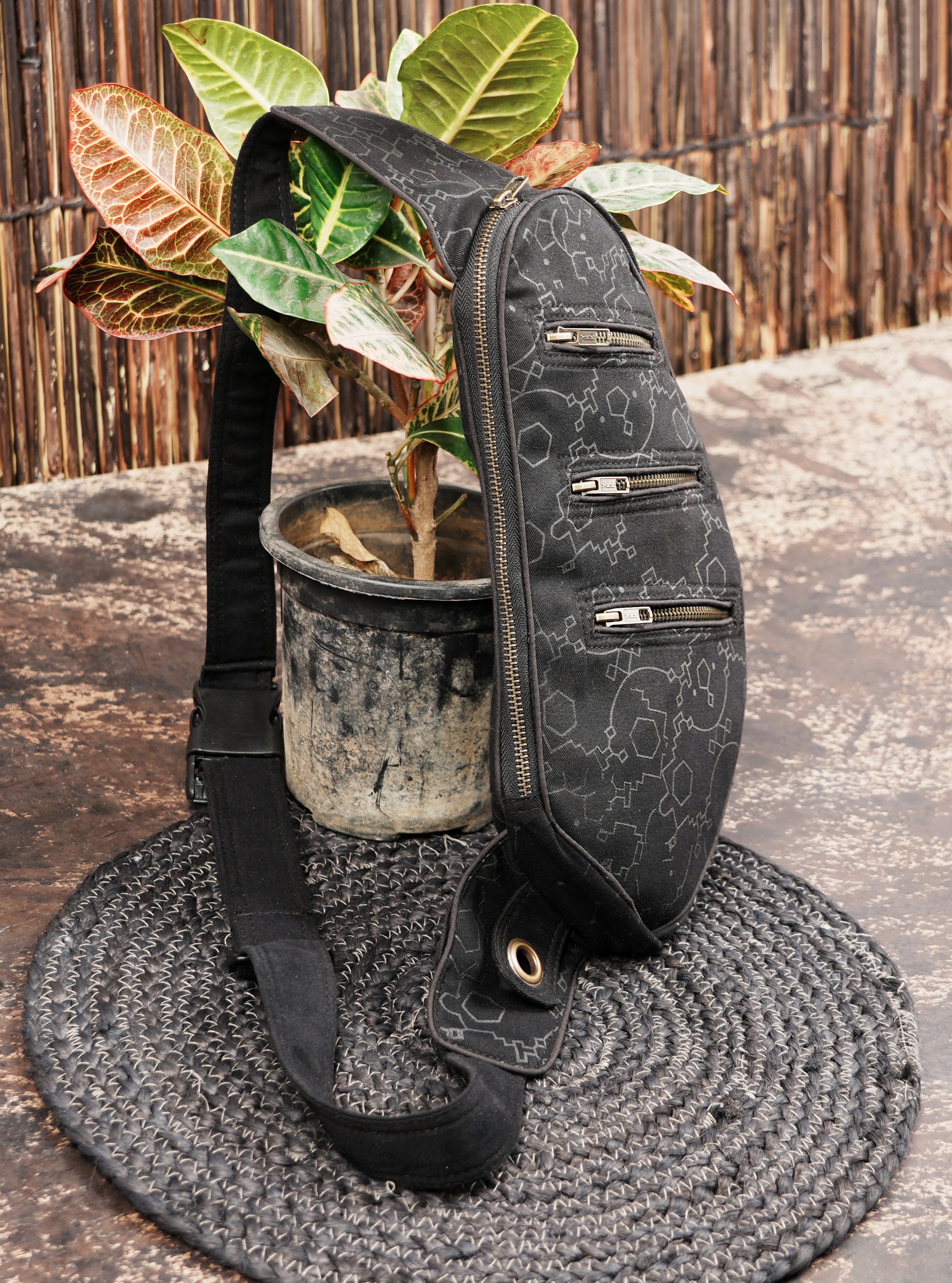 Black cotton sling bag for travel and daily use