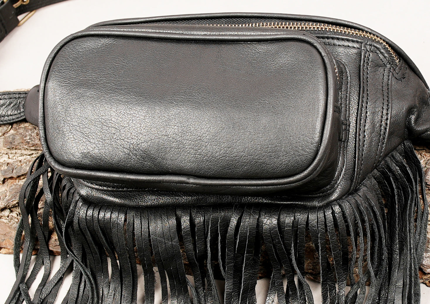 Adjustable leather hip bag with front zipper pocket