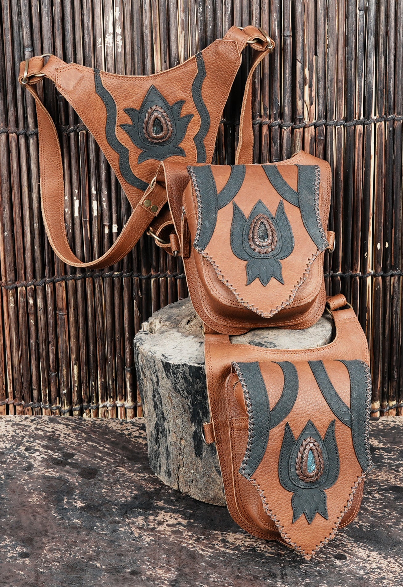 Artisan leather holster with dual leg pouches and secure buckles