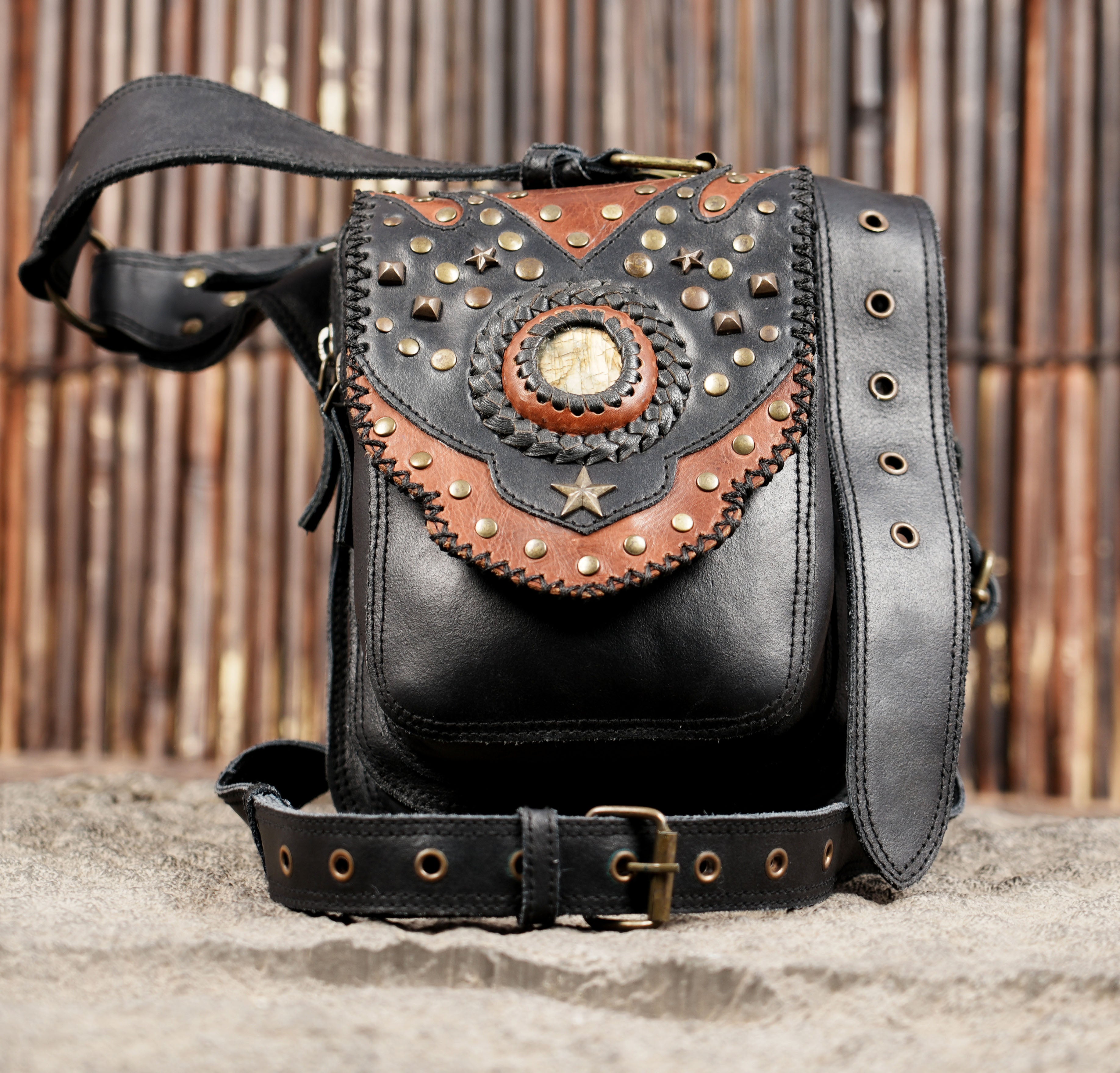 Leather thigh belt bag with reinforced stitching and hardware