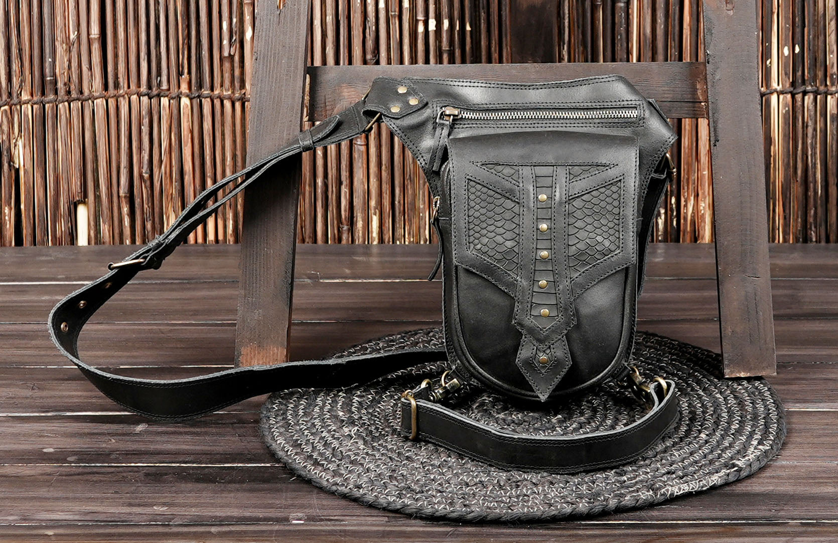 Black leather thigh harness belt with compact pouch