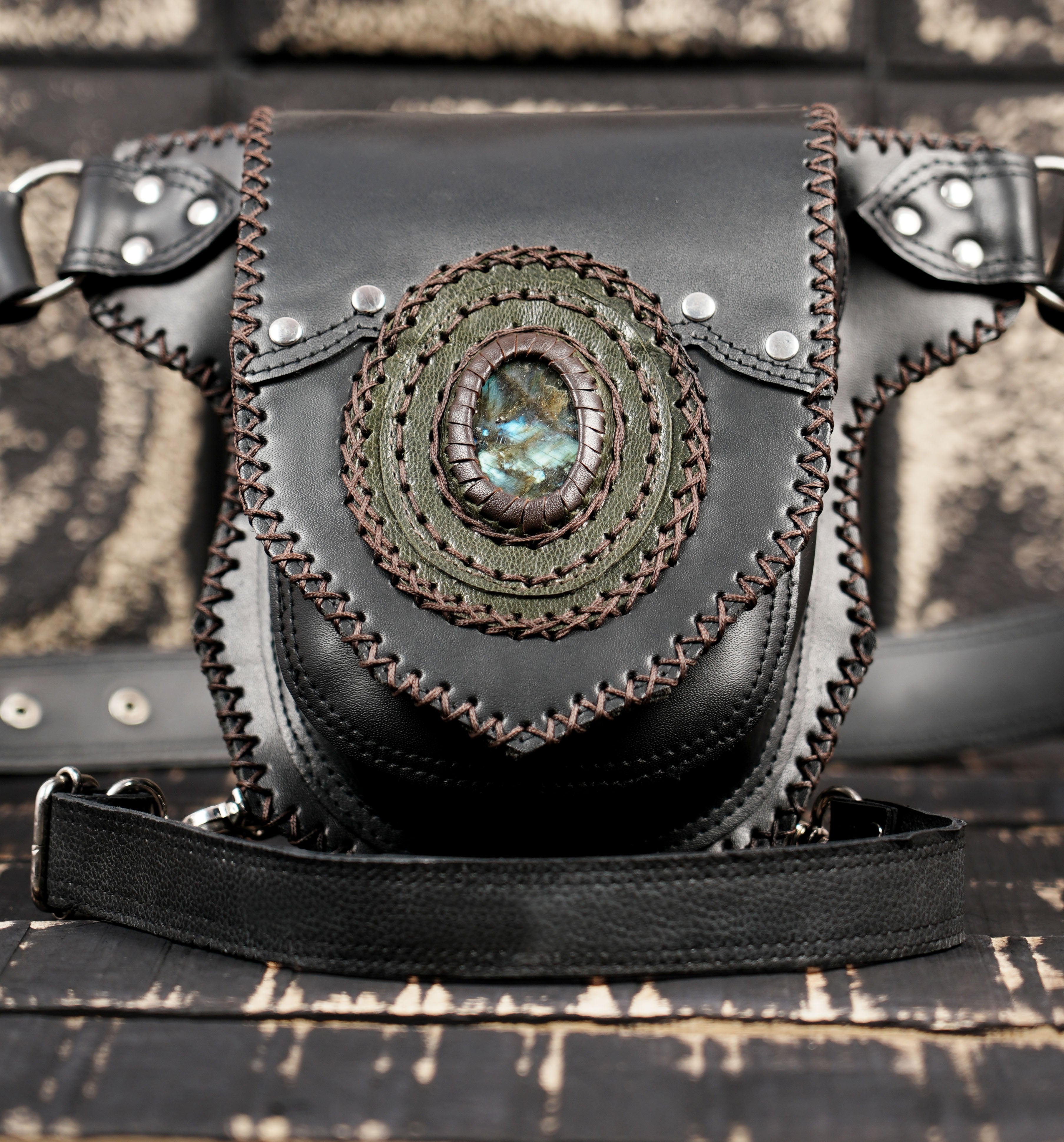 Leather waist and thigh belt pouch with oval gemstone design