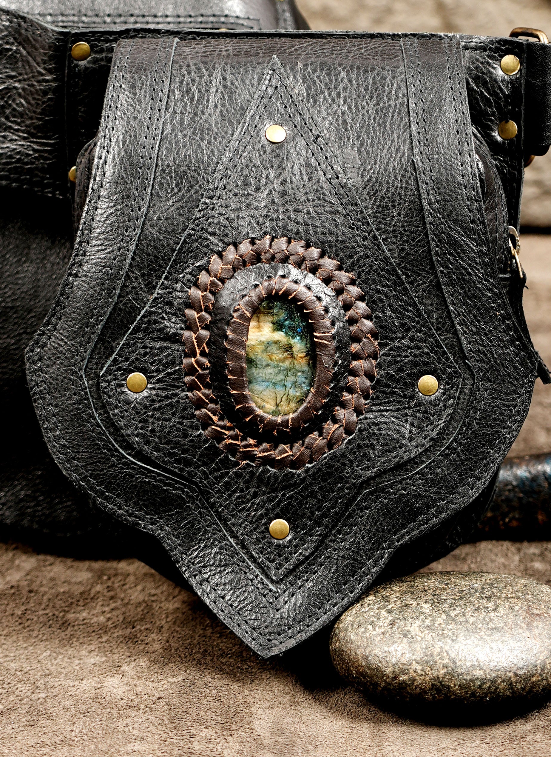 Black leather hip belt with pointed pouch and stone