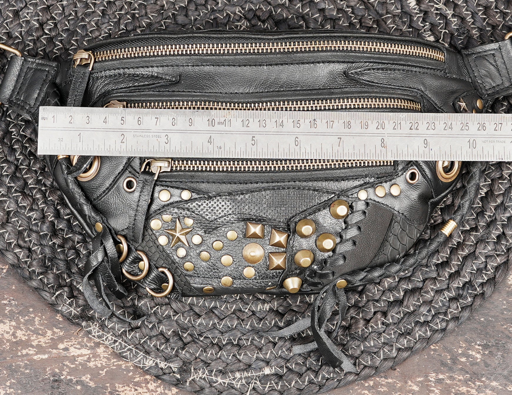 Leather shoulder belt with metal rings rivets and front zip pocket