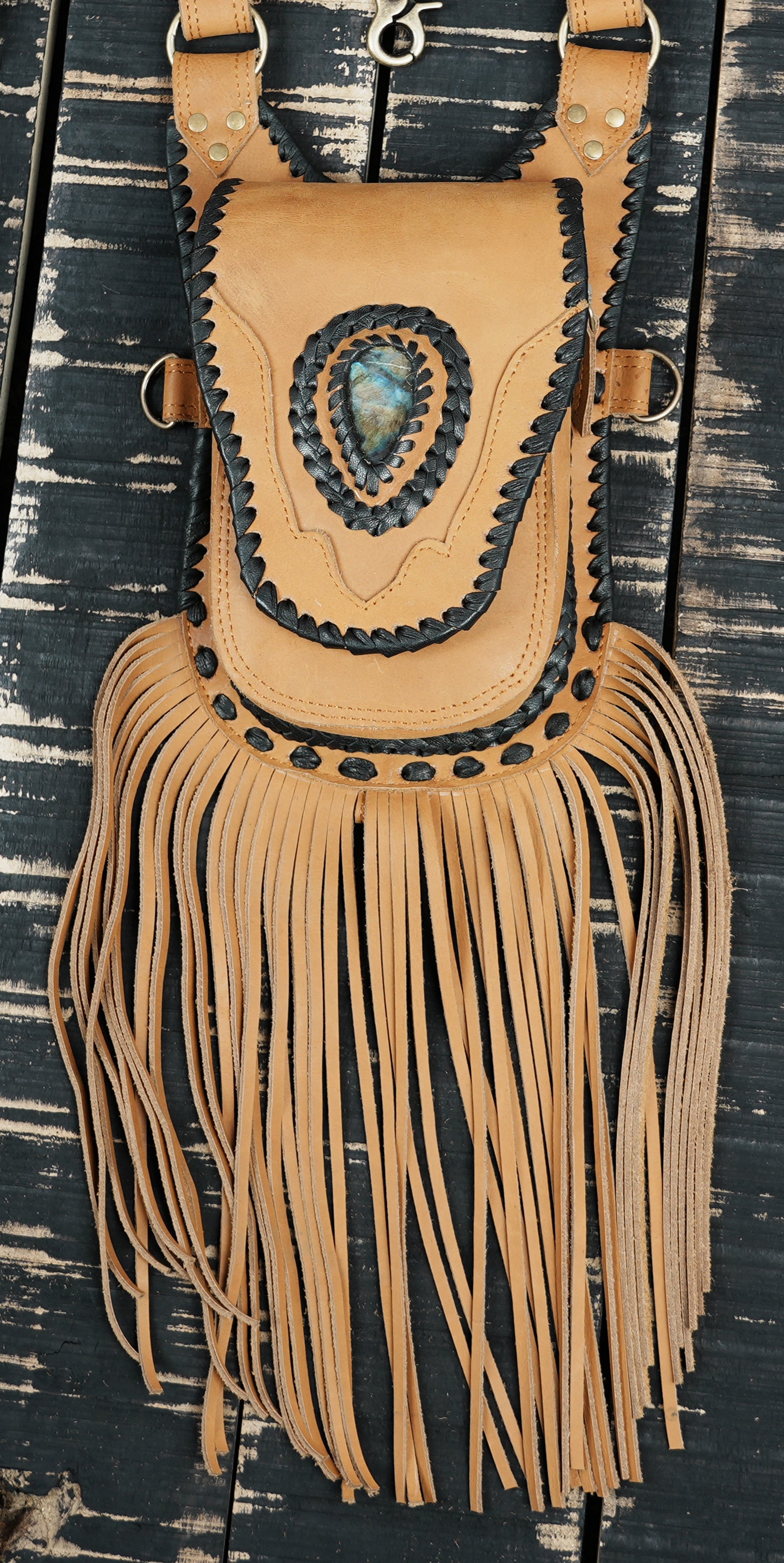 Genuine leather crossbody holster with adjustable straps and front pouch