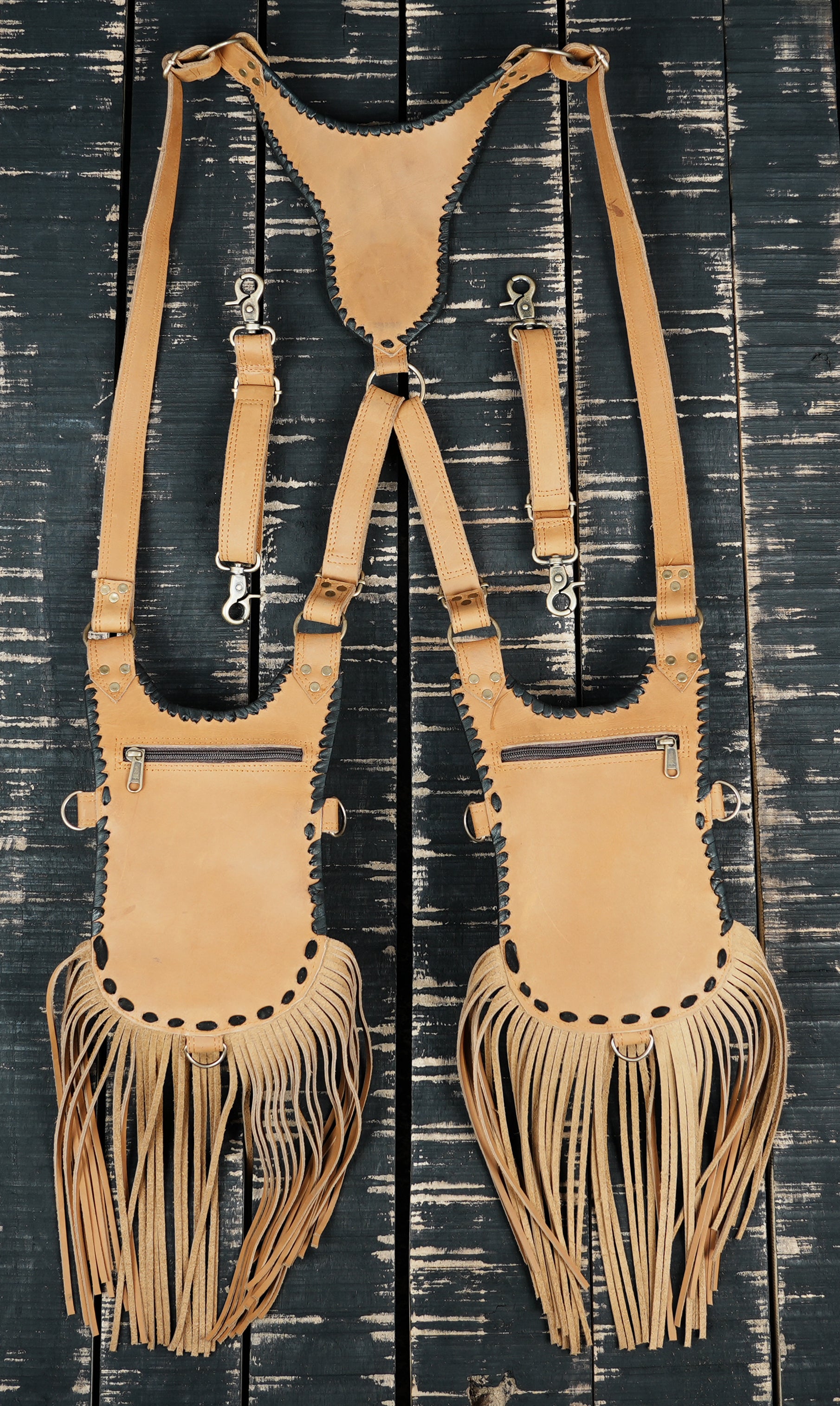 Festival leather holster for hands free carrying with tribal stitching