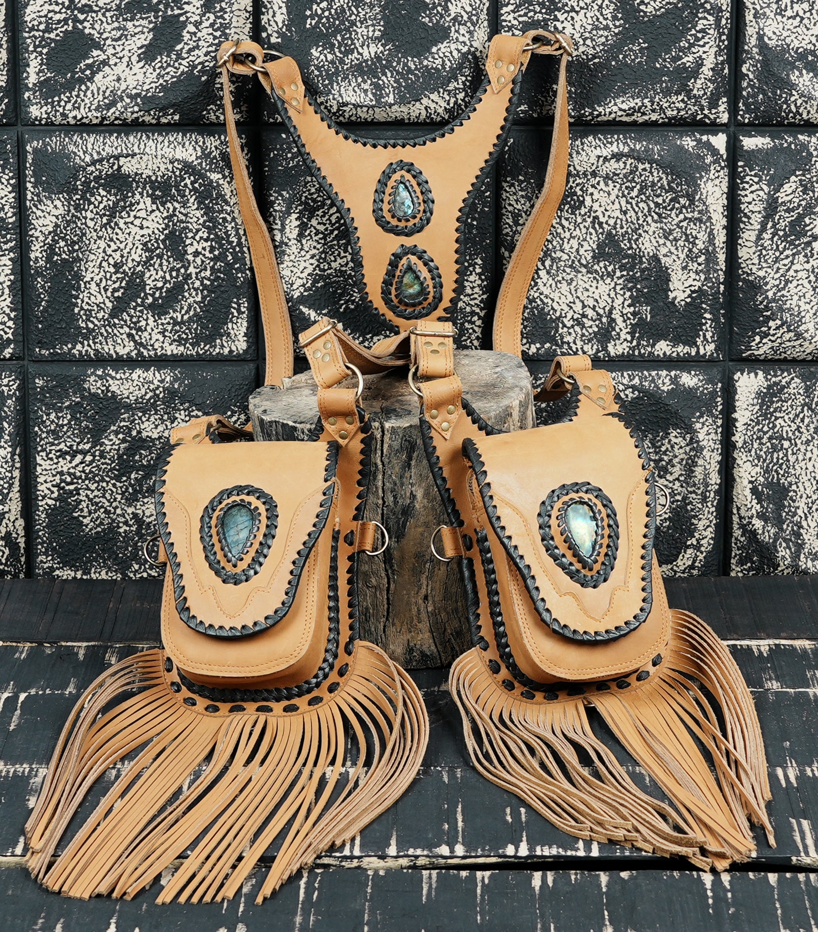 Artisan leather shoulder holster with black whip stitching detail