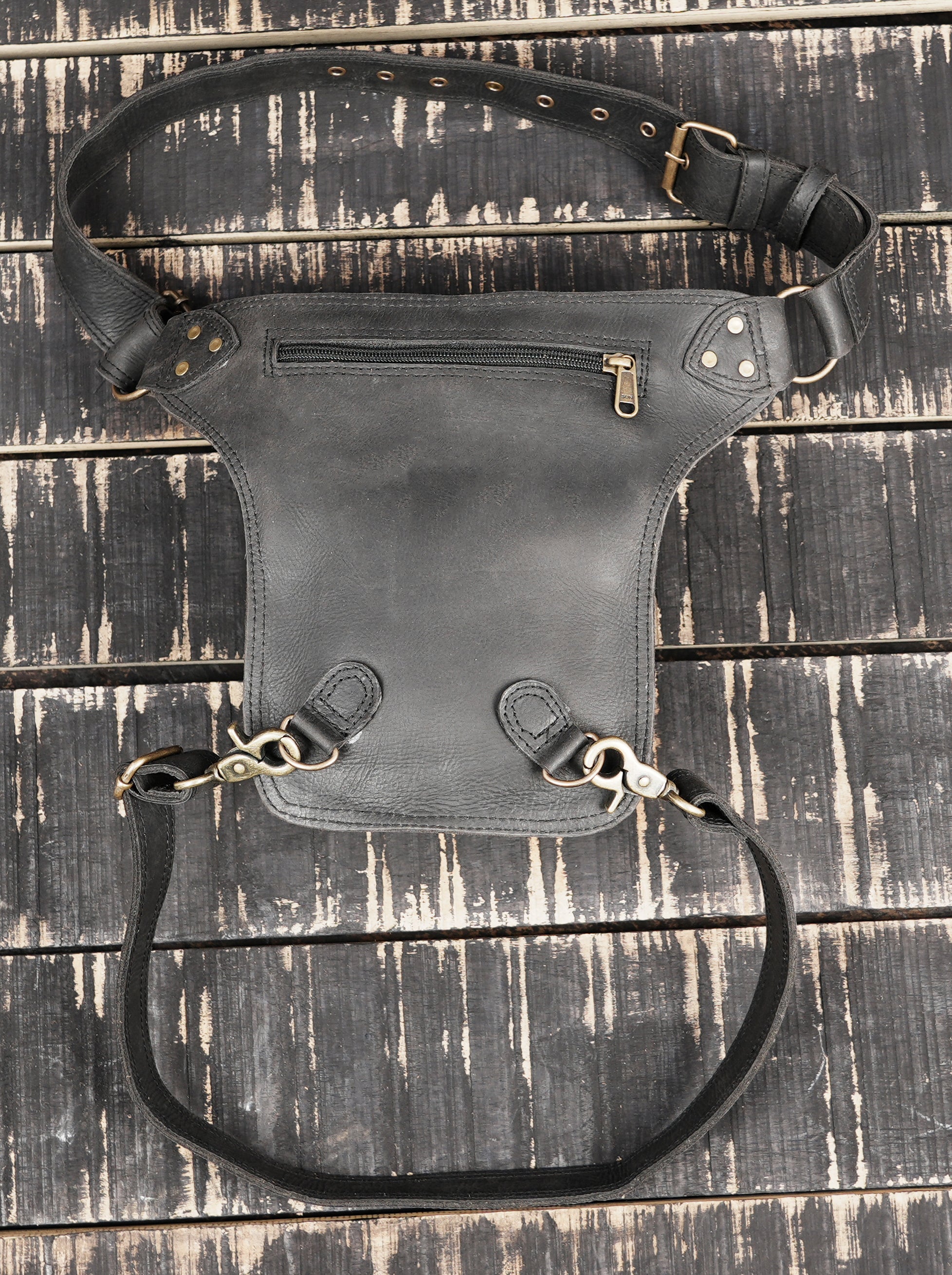 Black leather thigh belt with front pouch and stud design