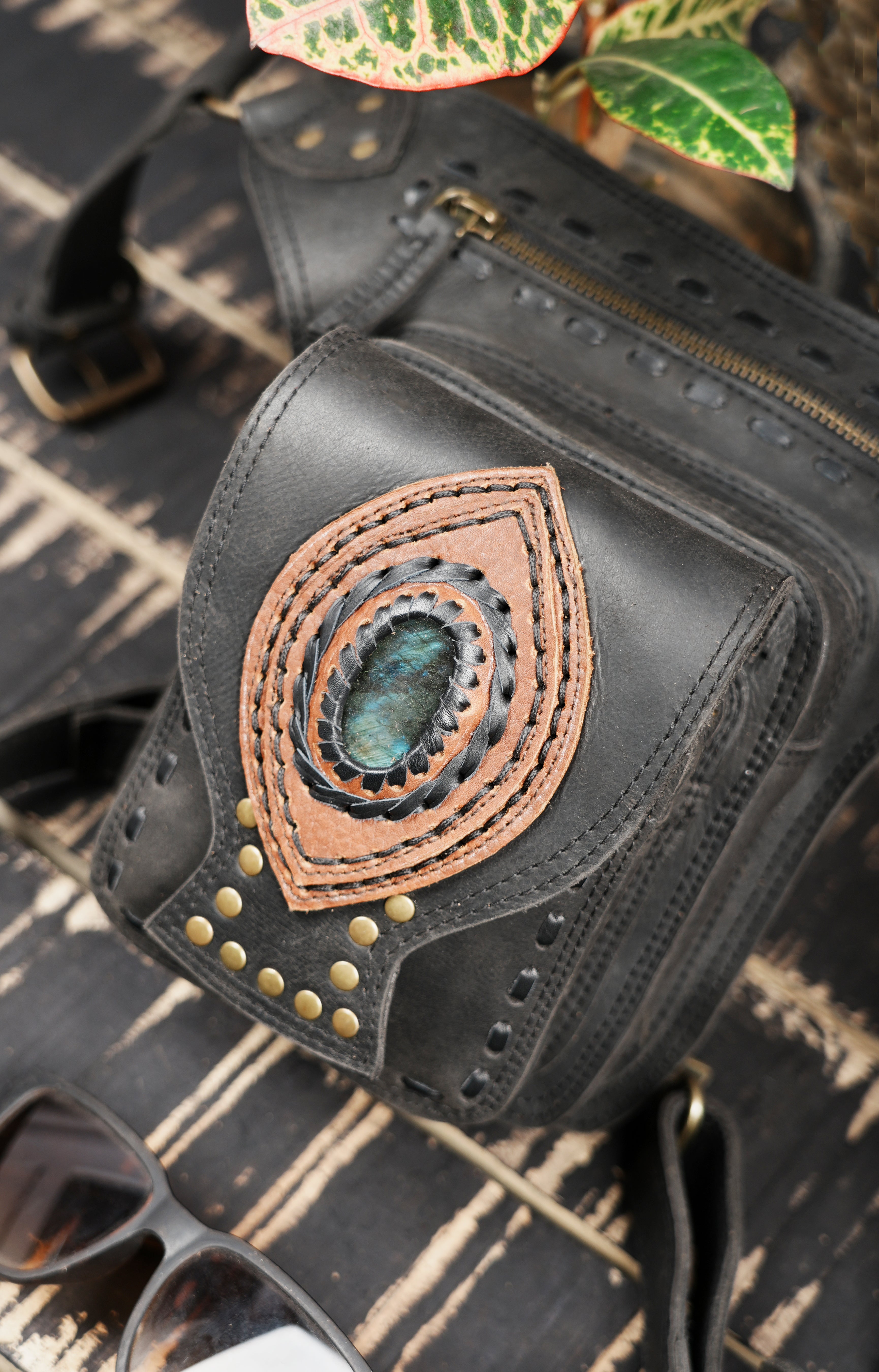 Black leather utility thigh belt for travel and outdoor use