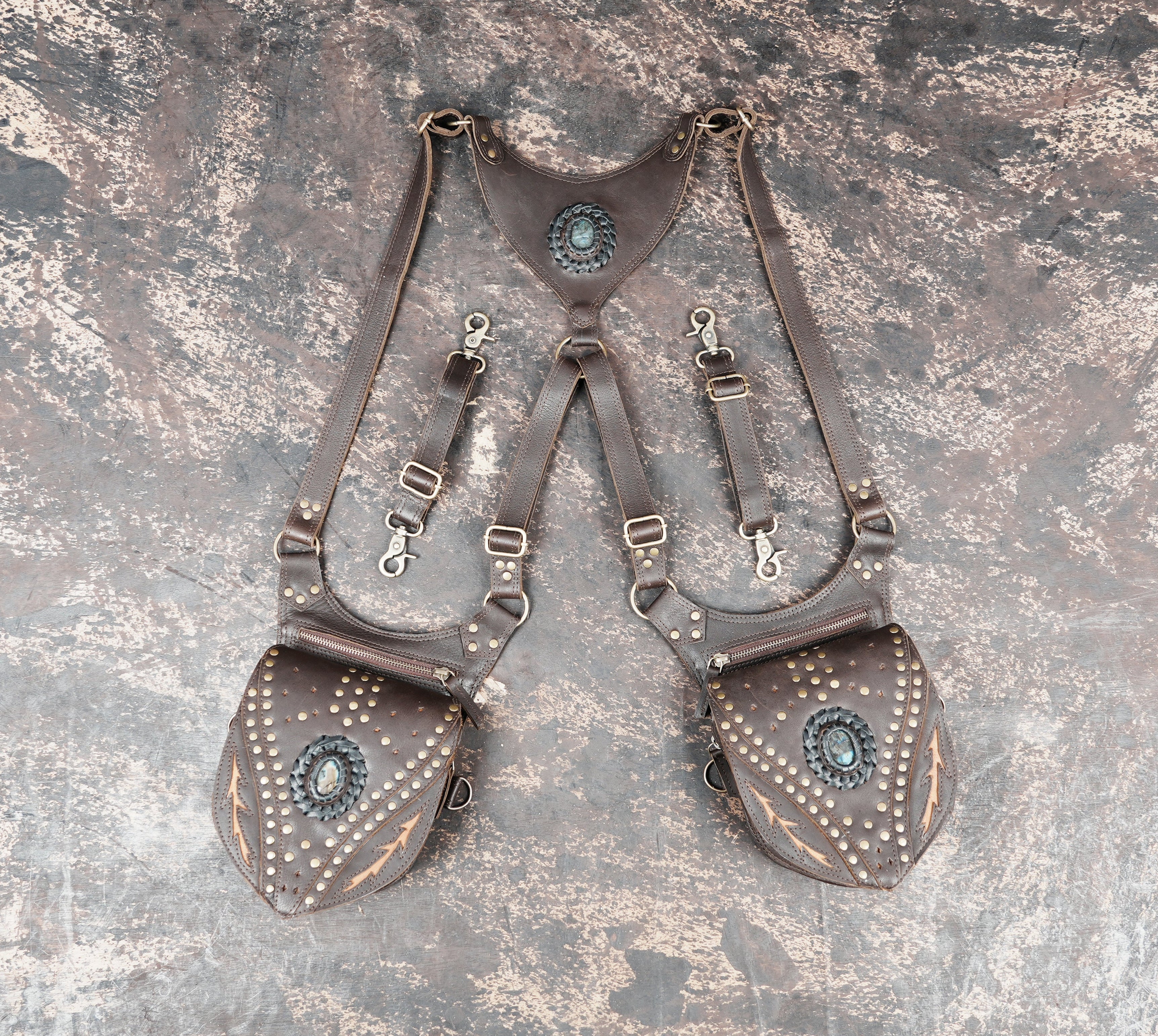 Handcrafted dark brown leather shoulder holster with dual zip pouches