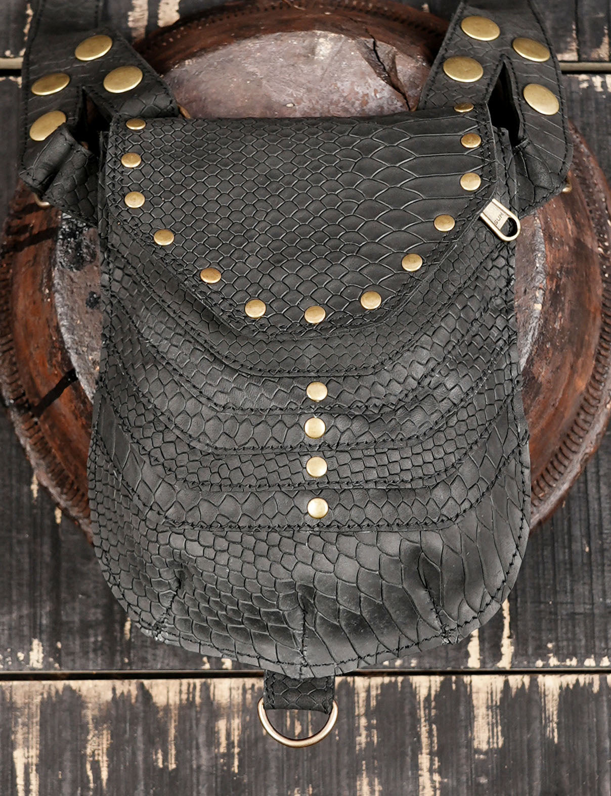 Genuine leather holster bag with adjustable straps and gothic tribal design