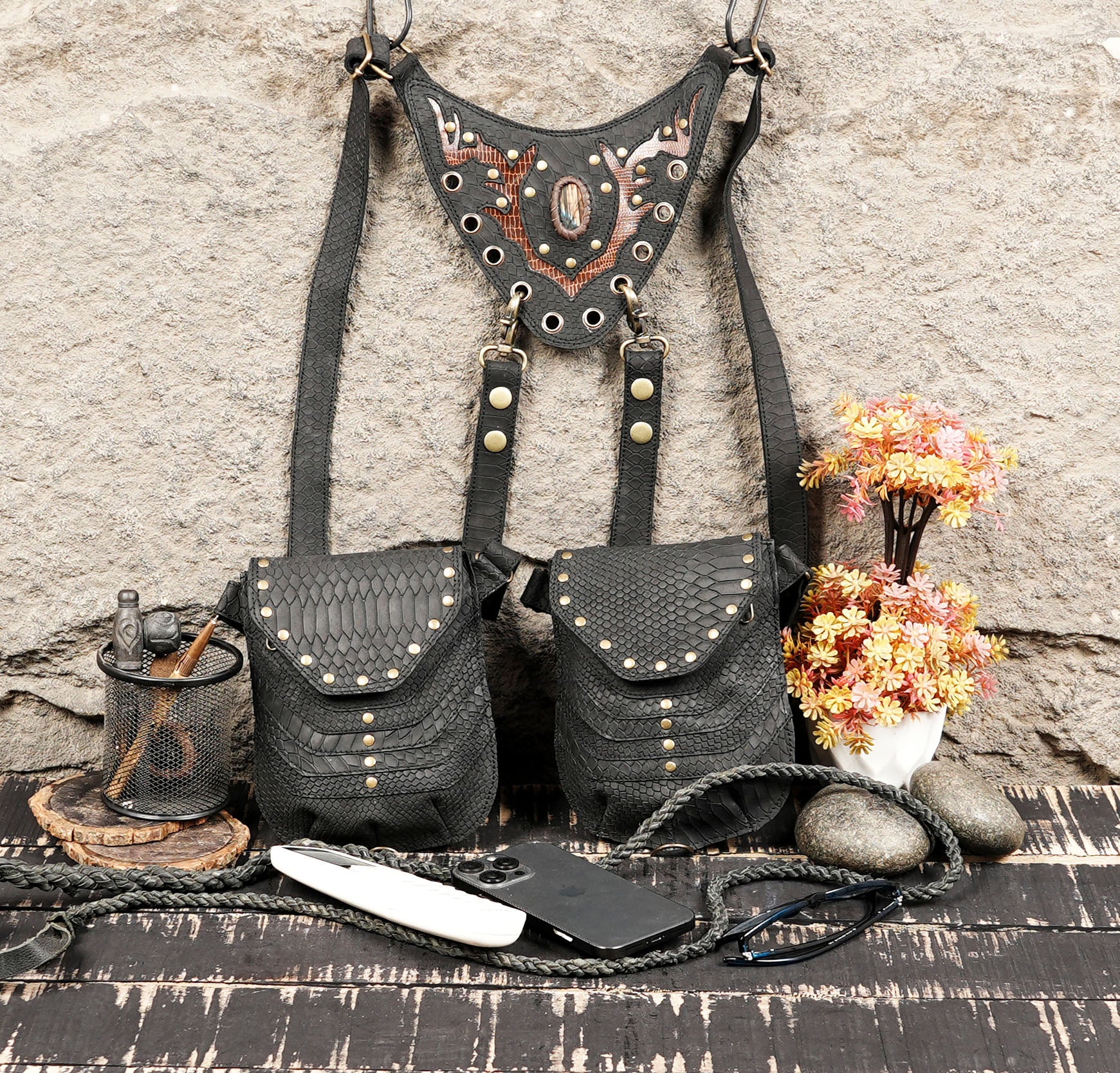 Leather utility holster bag with adjustable shoulder straps and vintage hardware