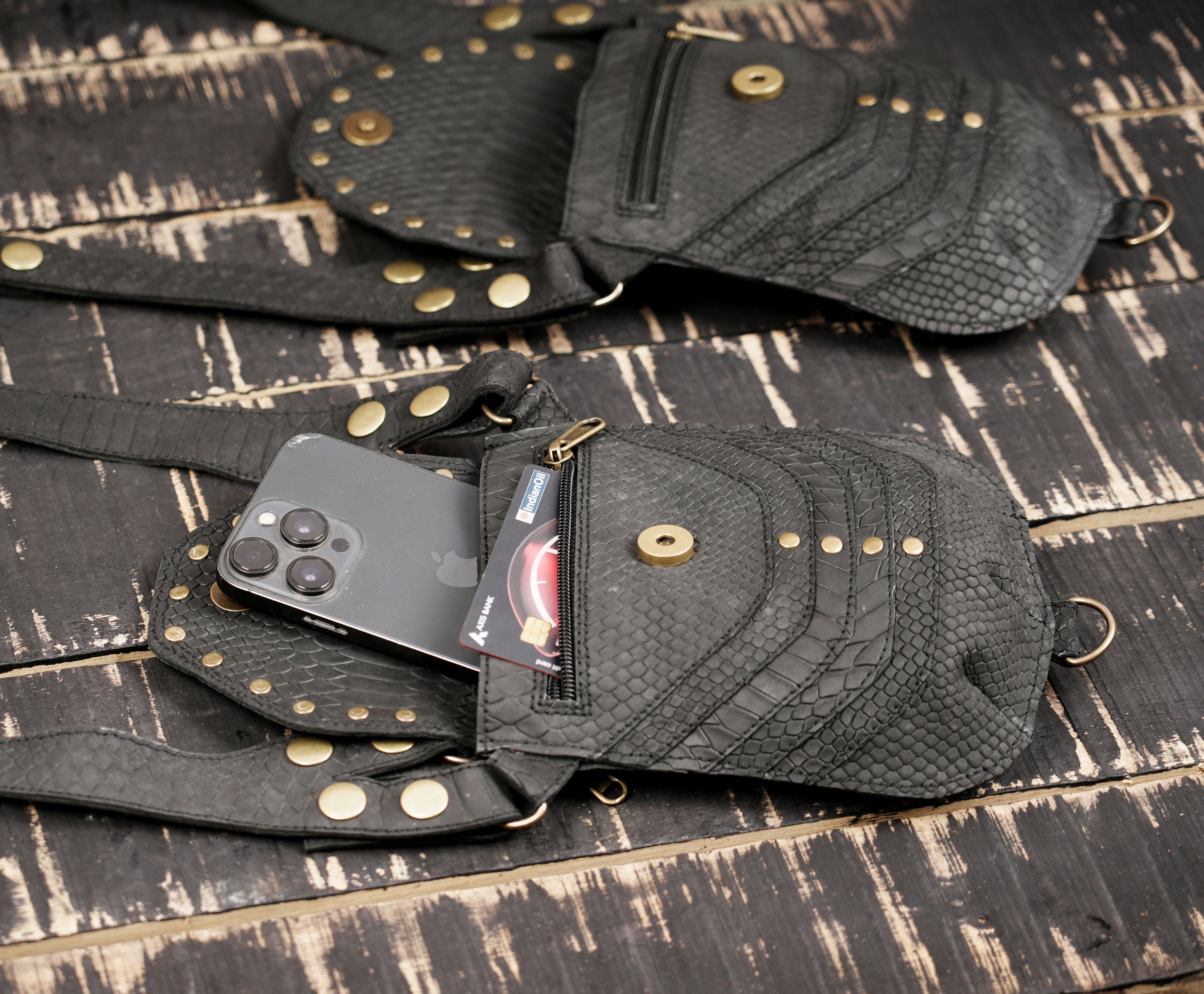 Handcrafted leather chest holster with detachable straps and metal rings