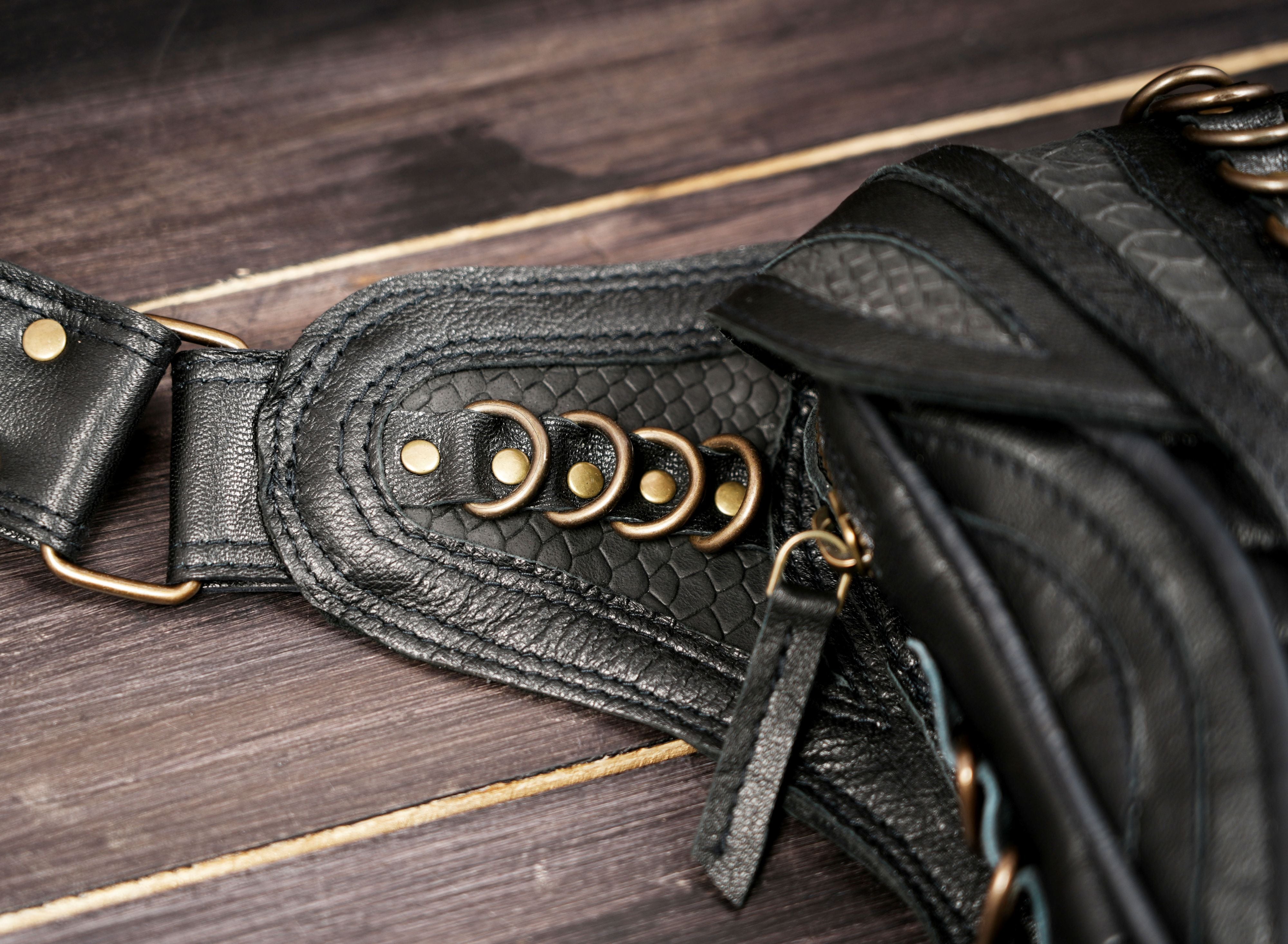 Adjustable leather waist belt with handcrafted layered panel design