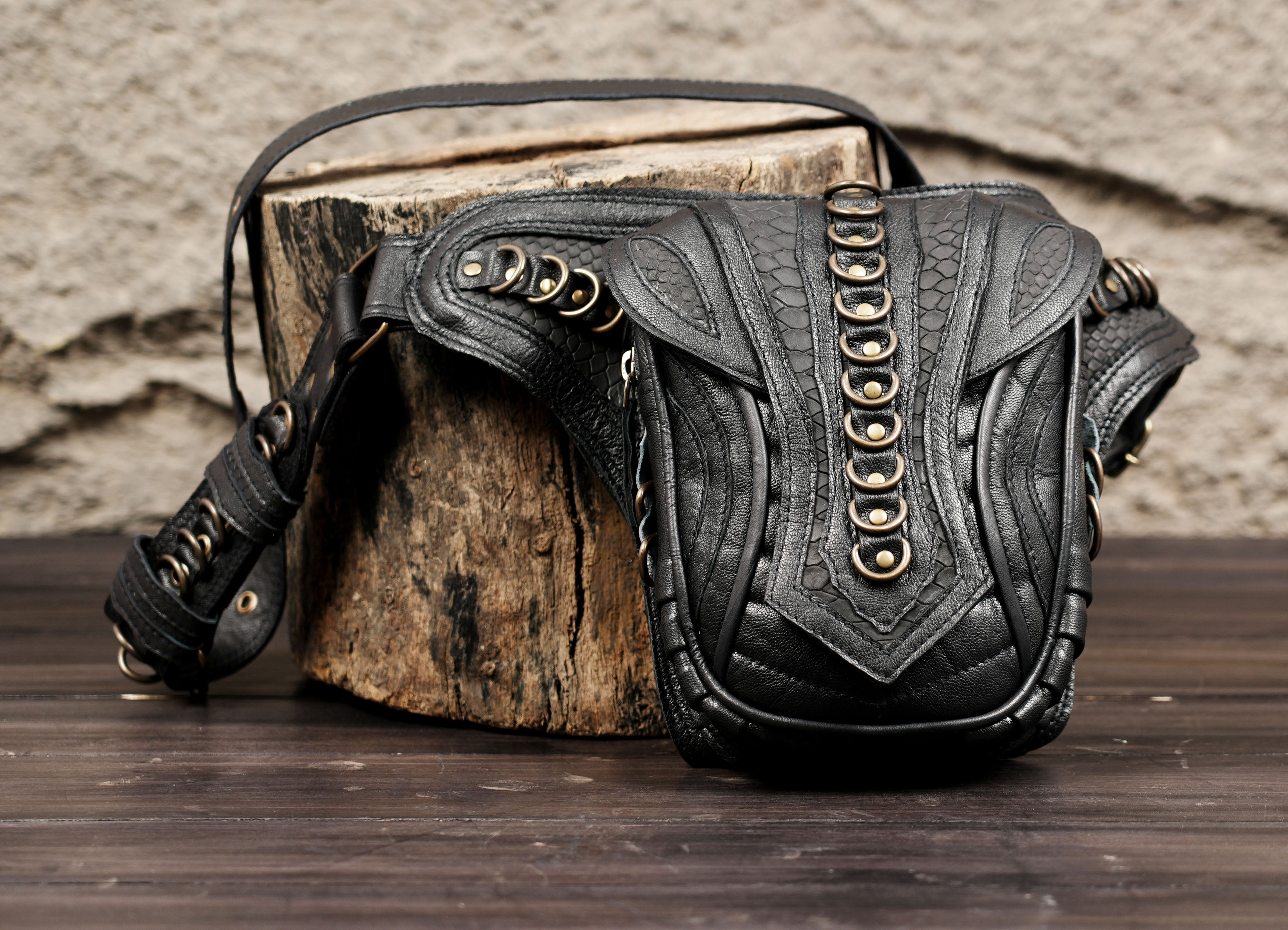 Black leather belt pouch with strong stitching and durable hardware