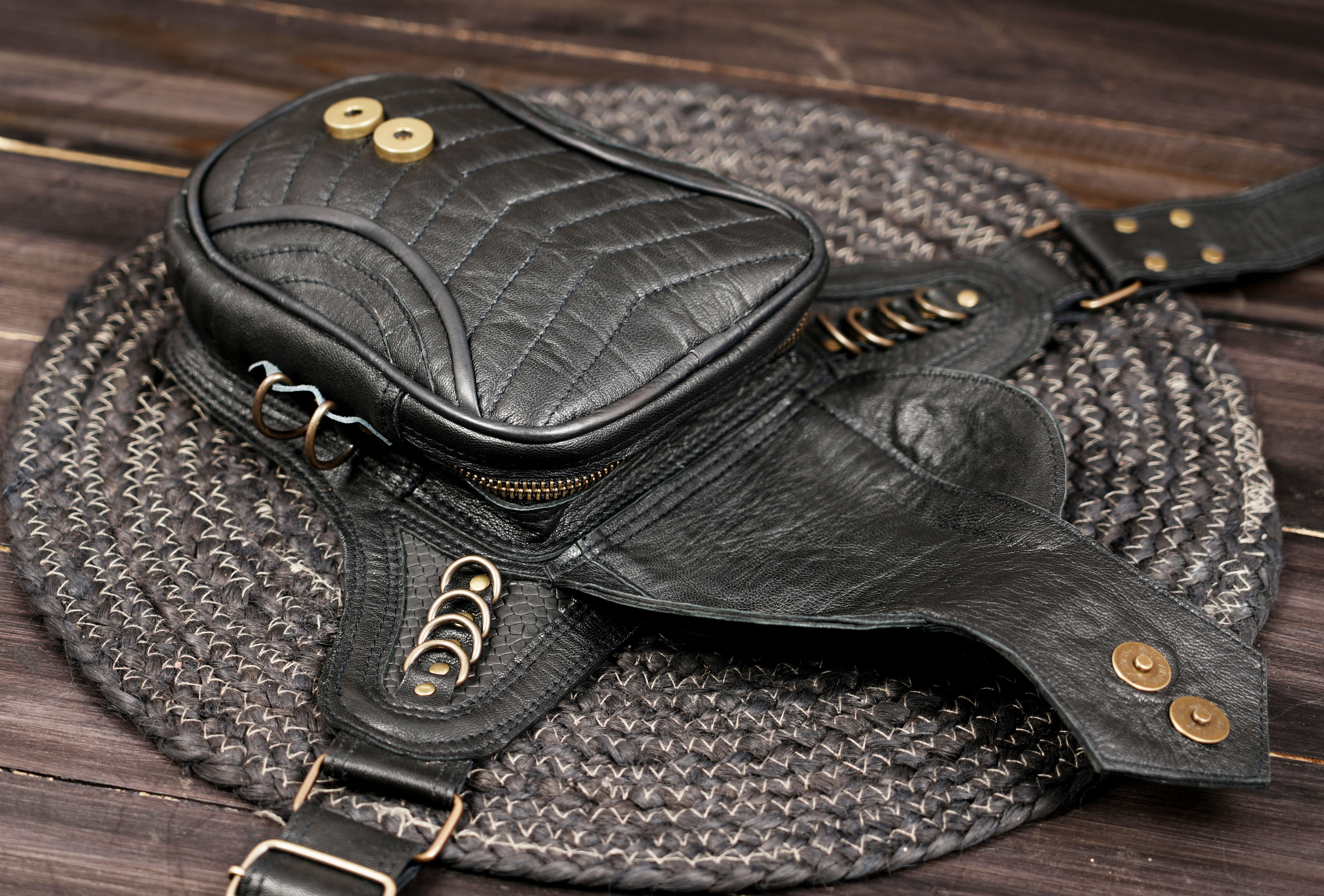 Handmade leather belt bag with adjustable strap and metal buckle