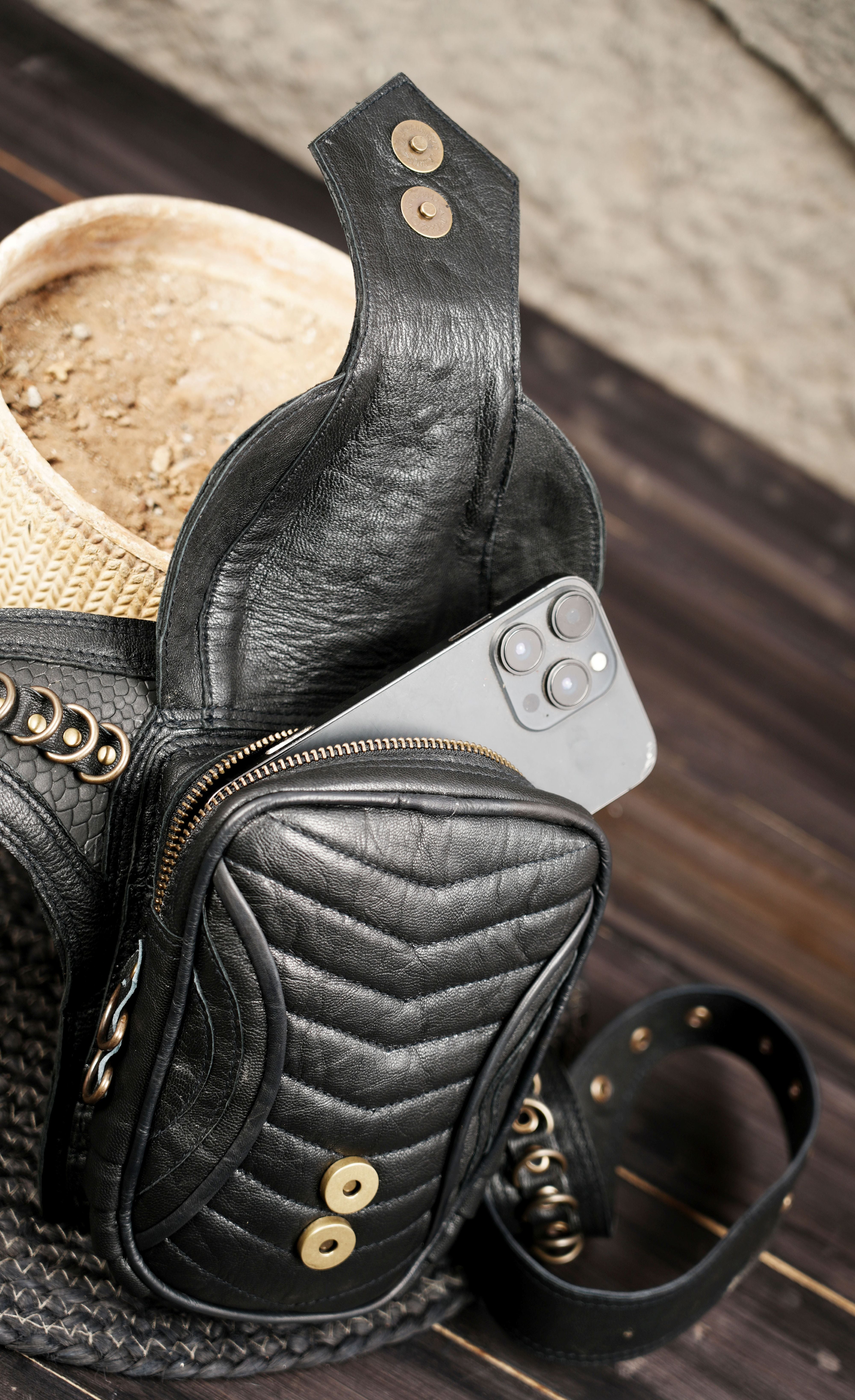 Festival ready leather waist belt bag with decorative metal elements