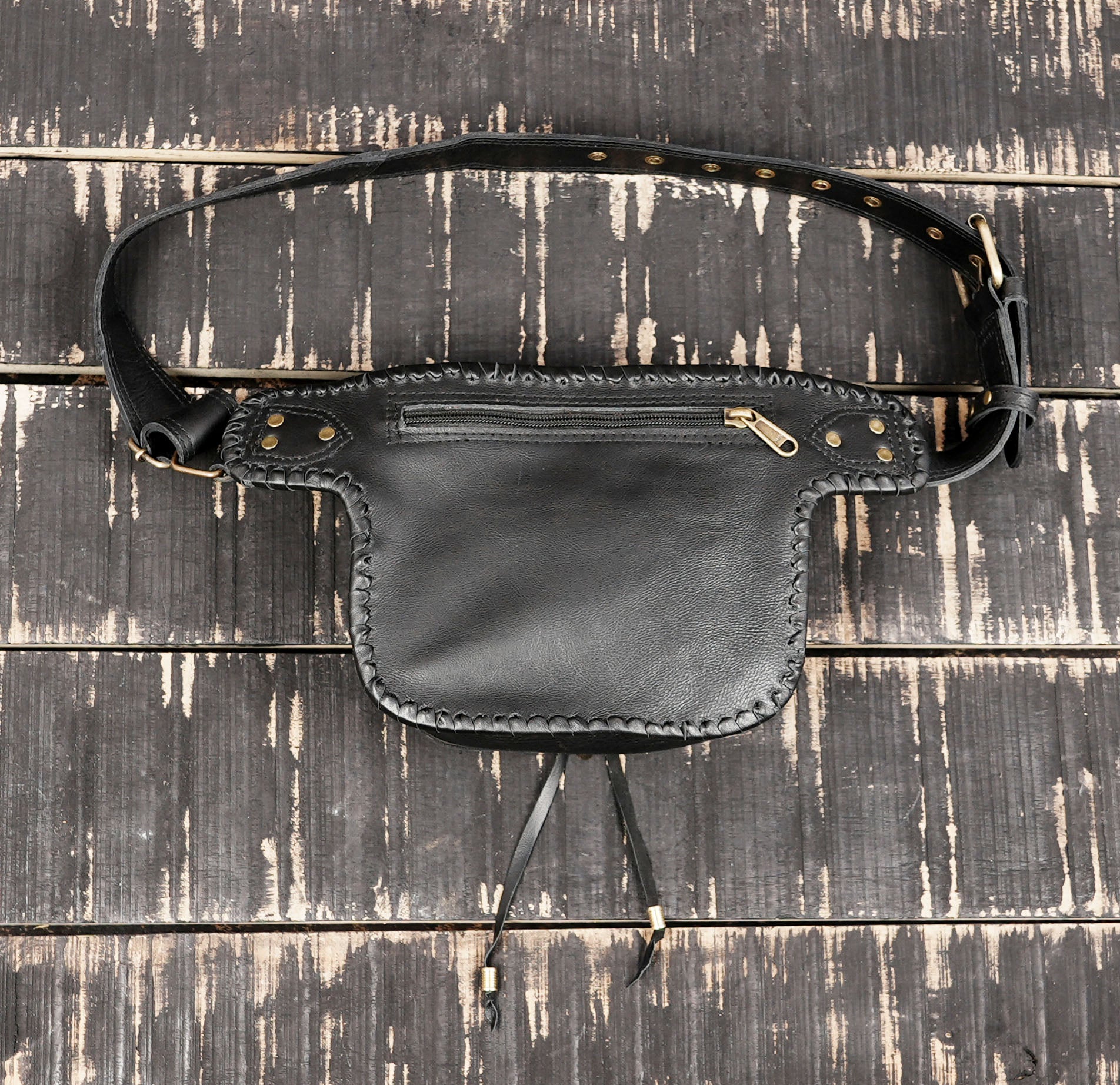 Utility leather waist belt for hands free carrying at events or travel
