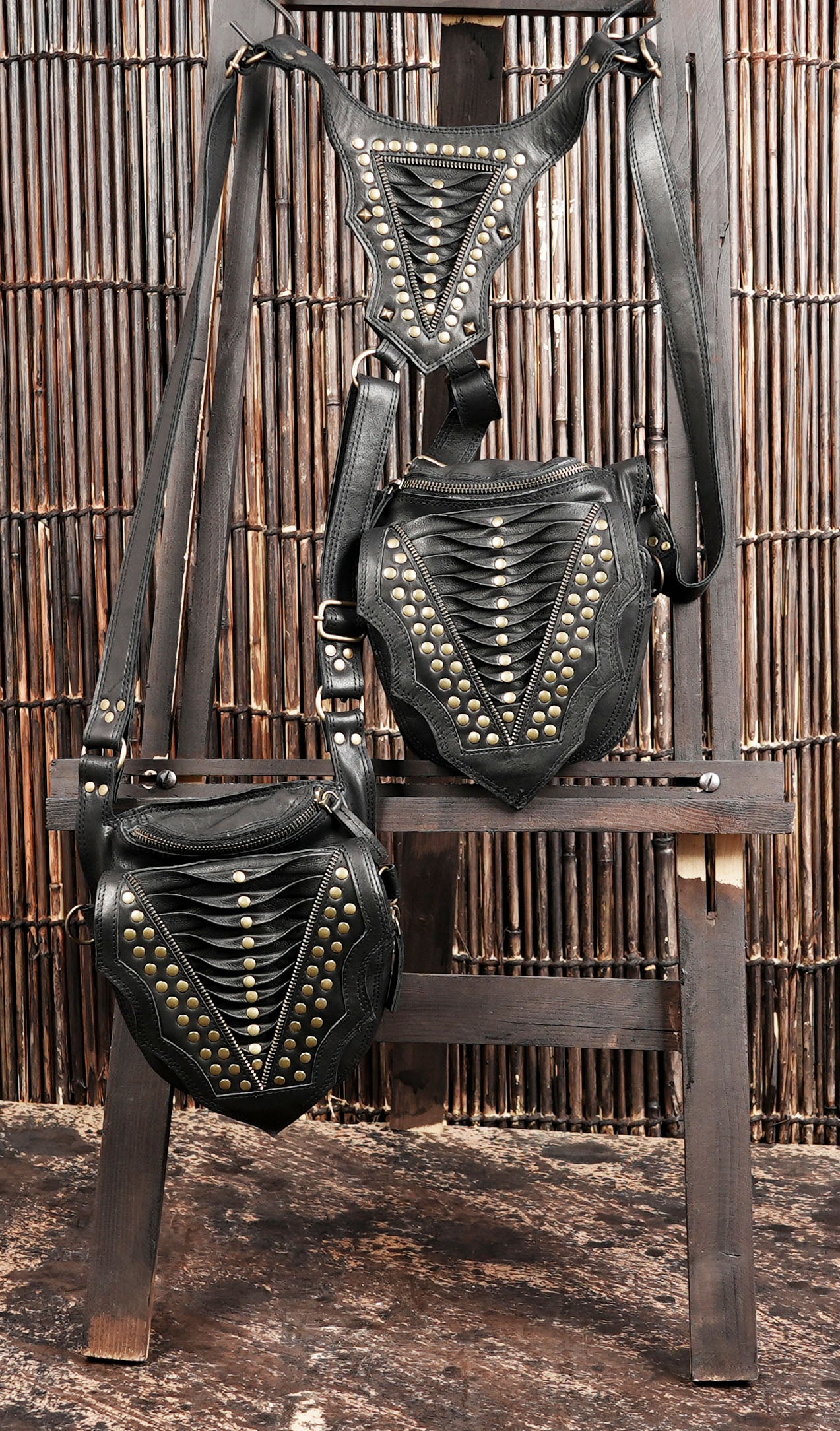 Steampunk leather holster accessory with detailed panel work and rivets