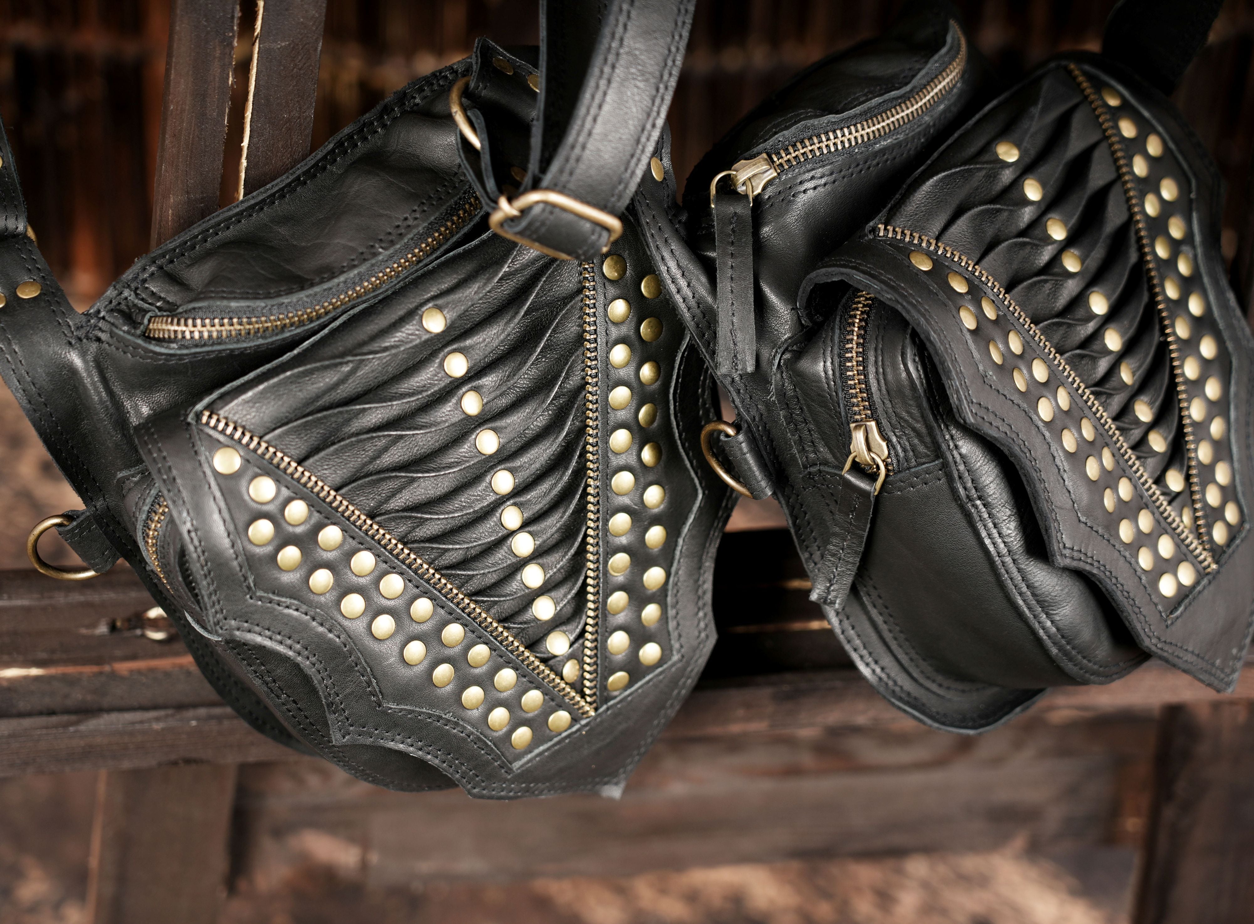 Cross strap leather holster with decorative studs and functional design