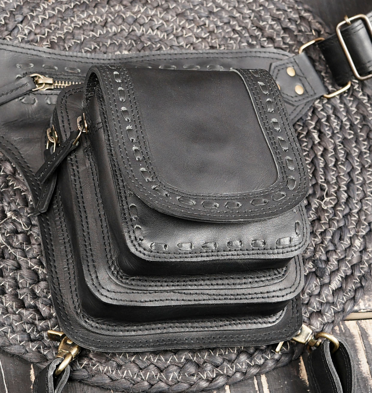 Adjustable leather waist and thigh belt with front utility pocket