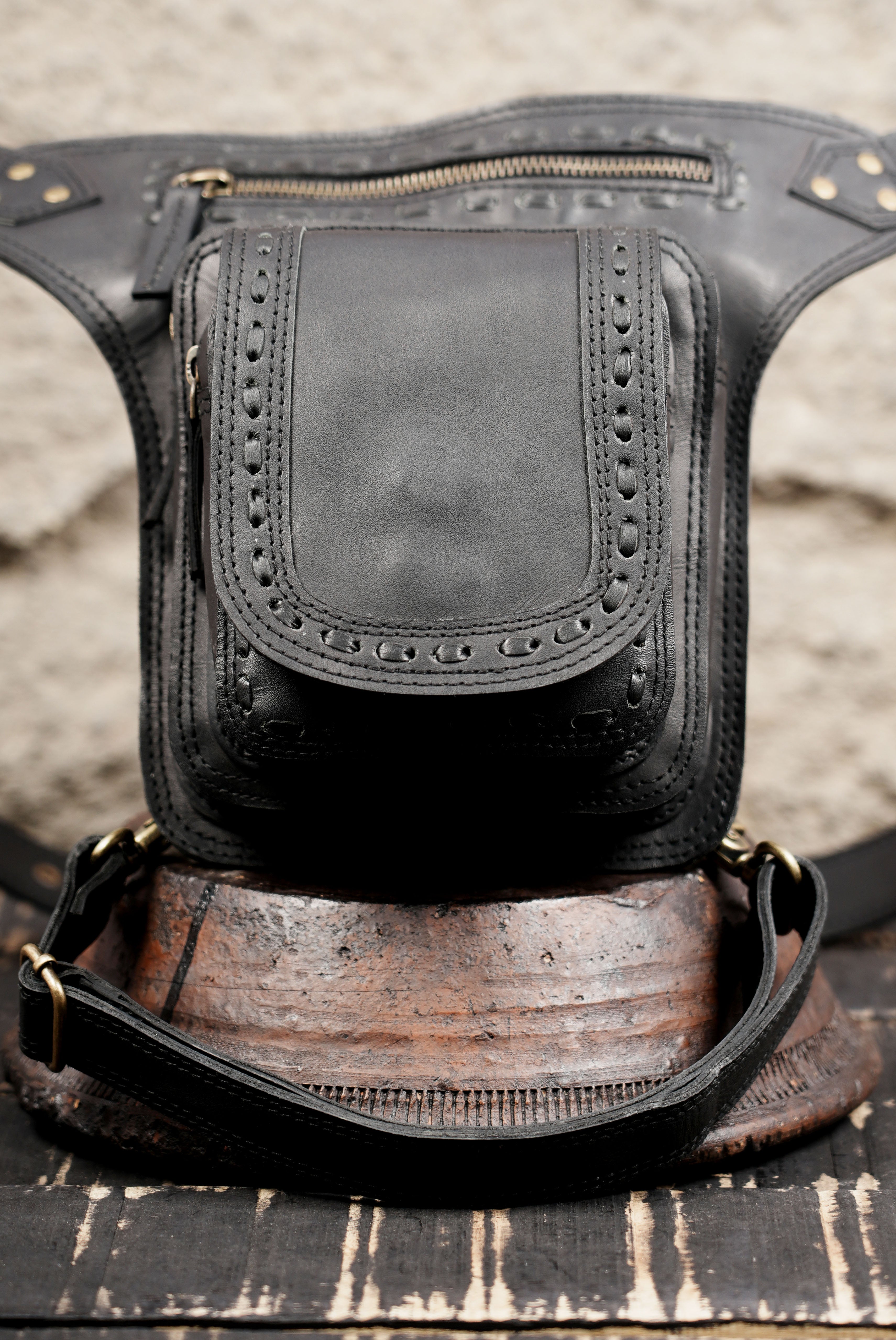 Unisex black leather thigh holster belt for festivals and travel