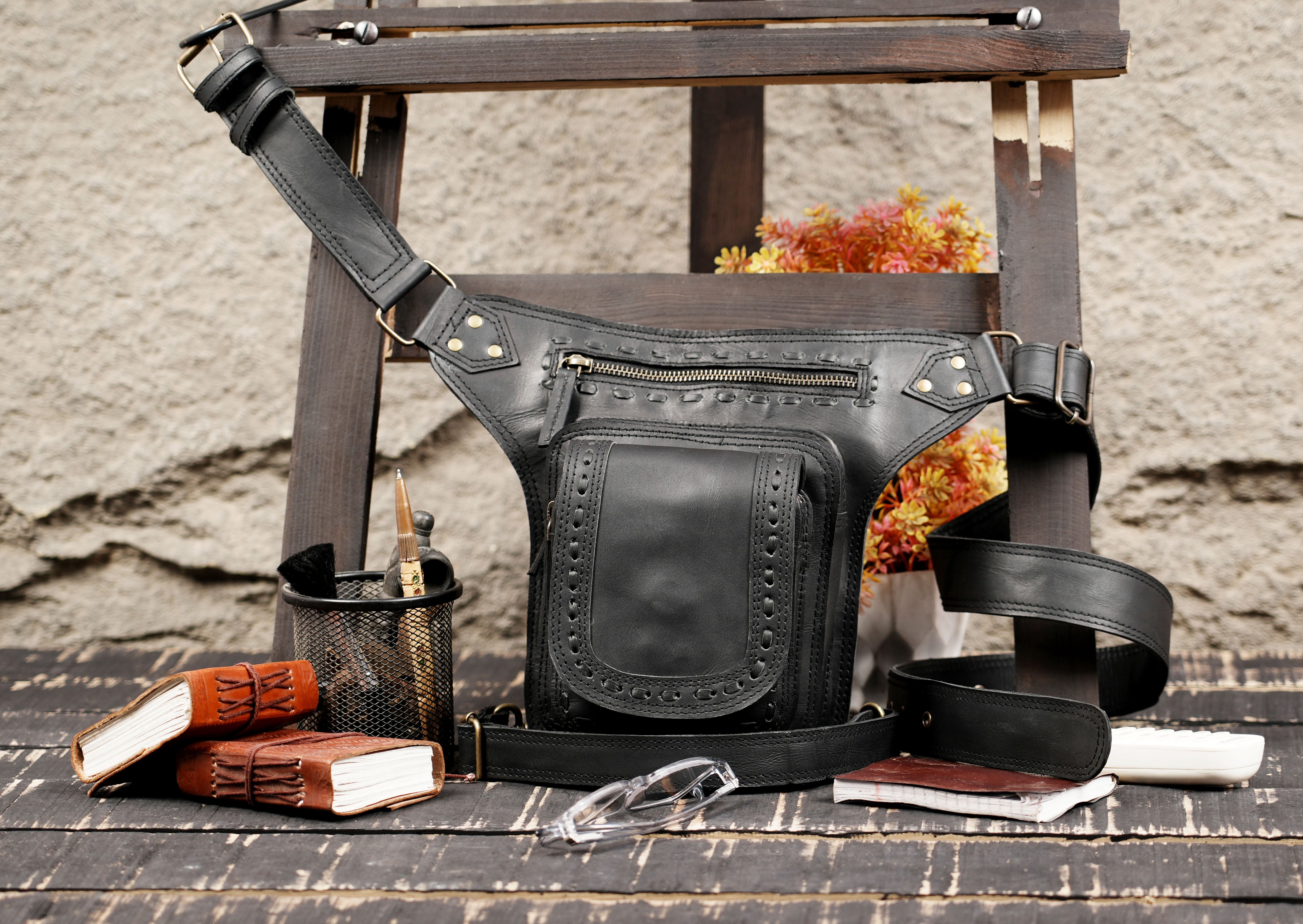 Handmade leather thigh belt with strong buckles and rivet accents