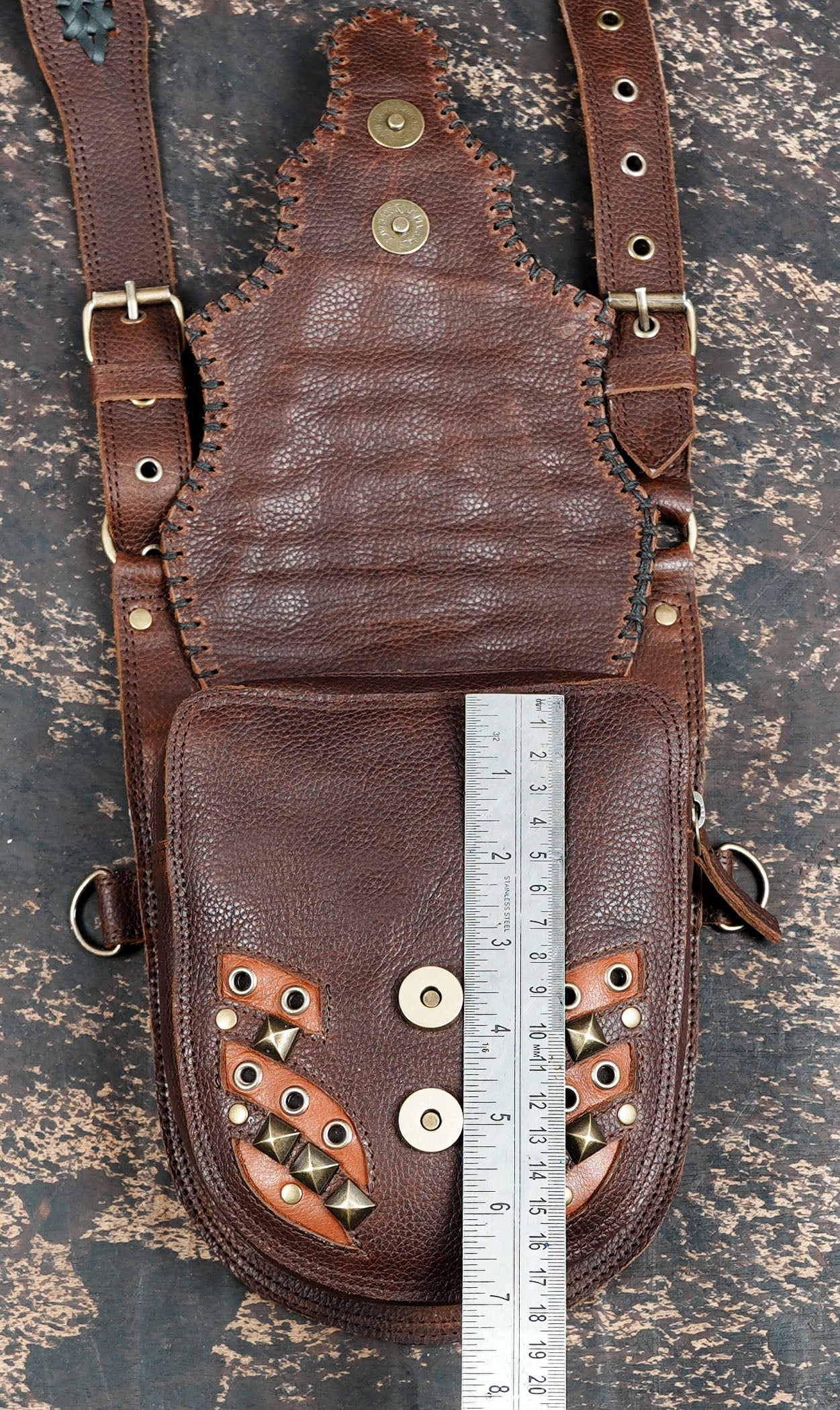 Festival ready leather holster with adjustable shoulder straps
