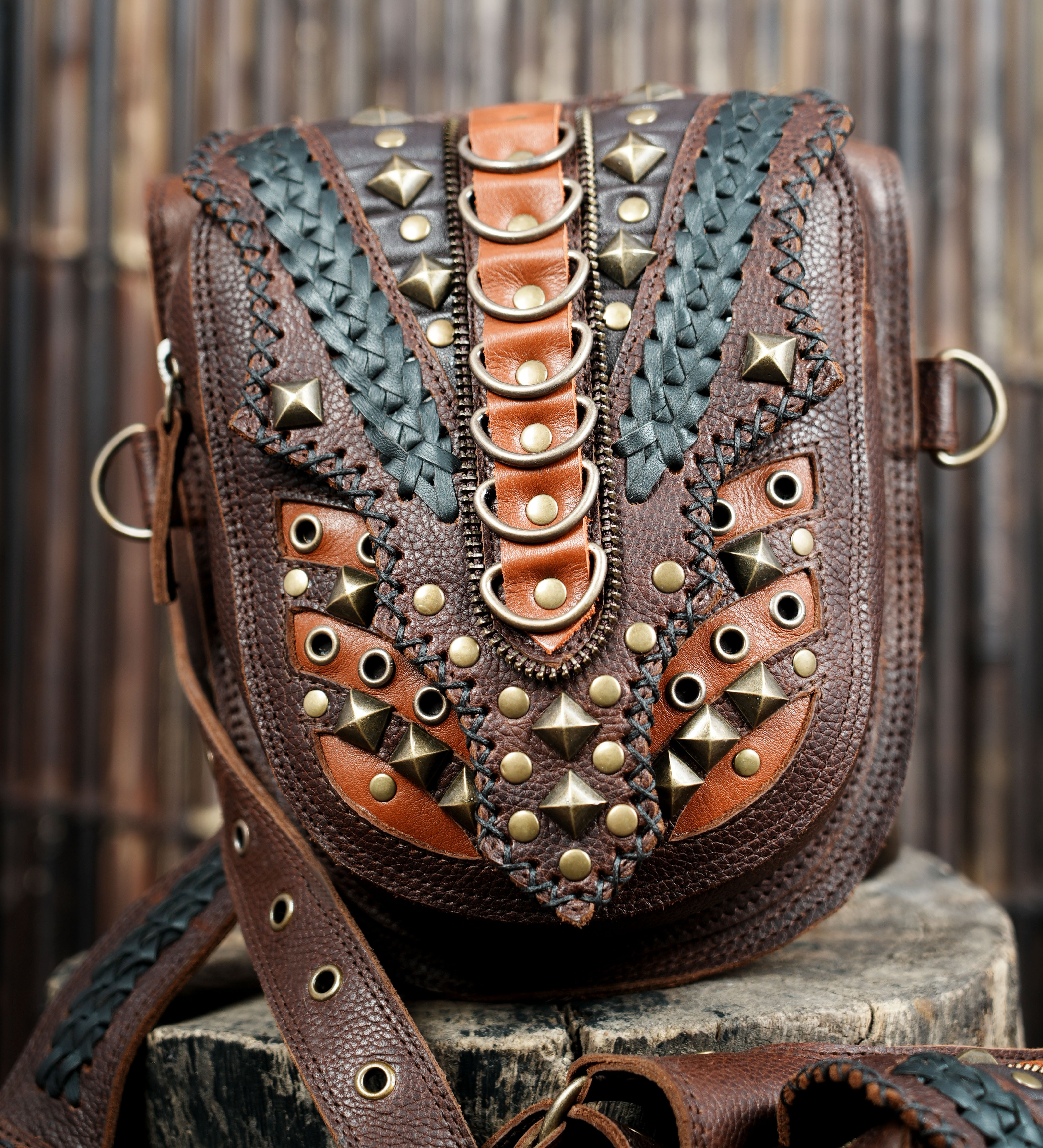 Steampunk style leather shoulder holster with twin utility pockets