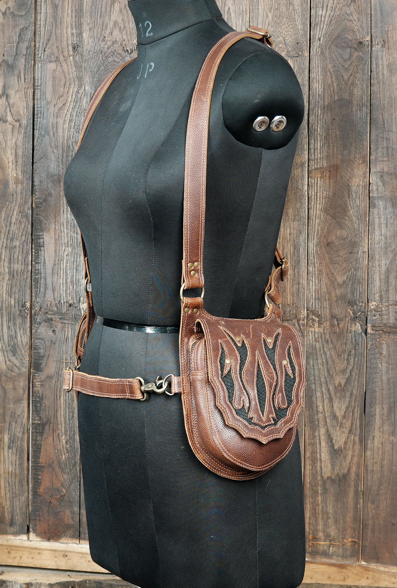 Leather chest and shoulder holster with balanced weight design