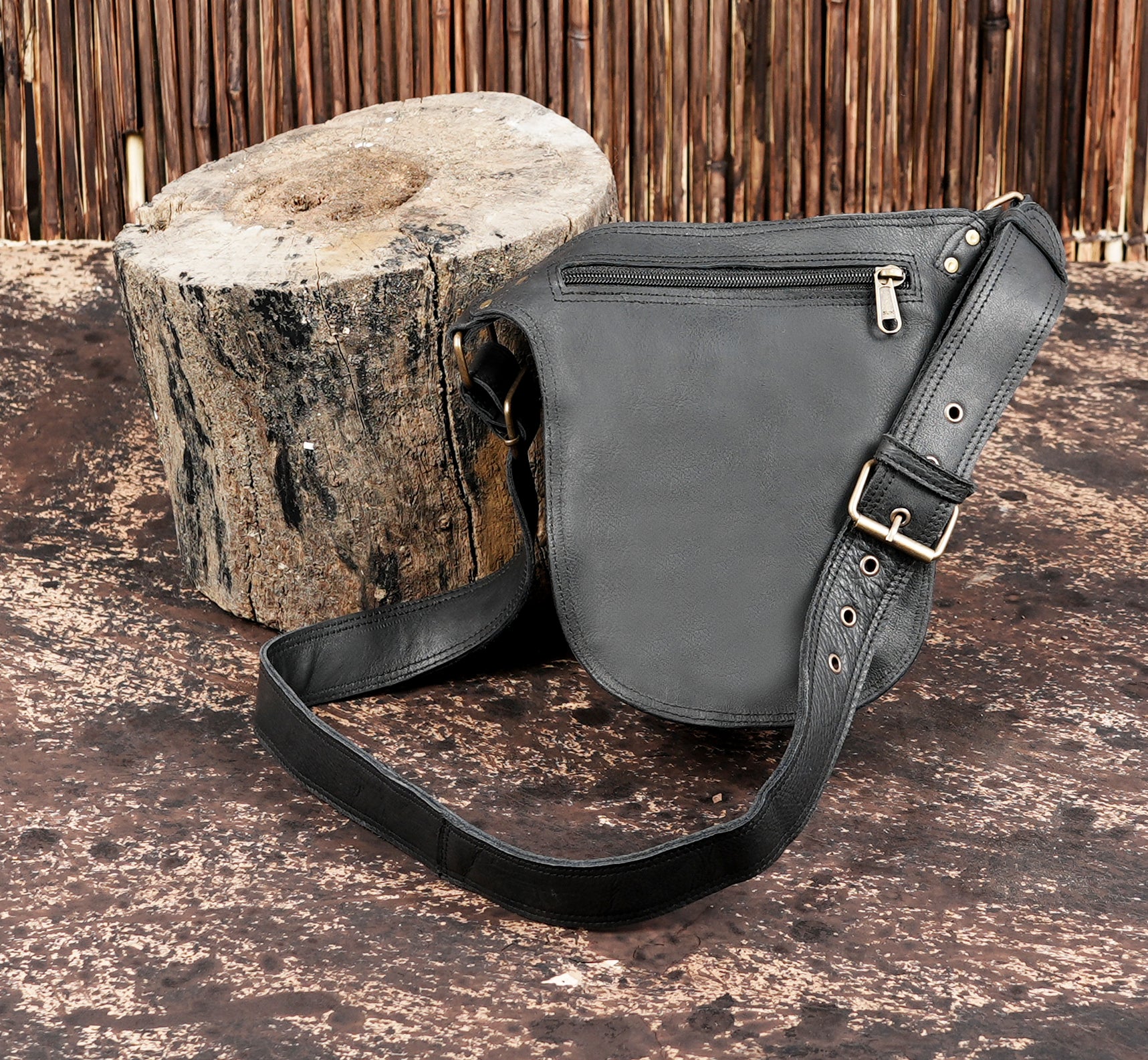 "Unique textured leather waist pouch for festivals and travel"