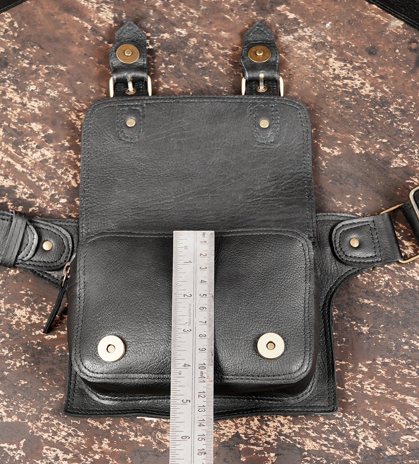 "Compact leather waist pouch for essentials and accessories"