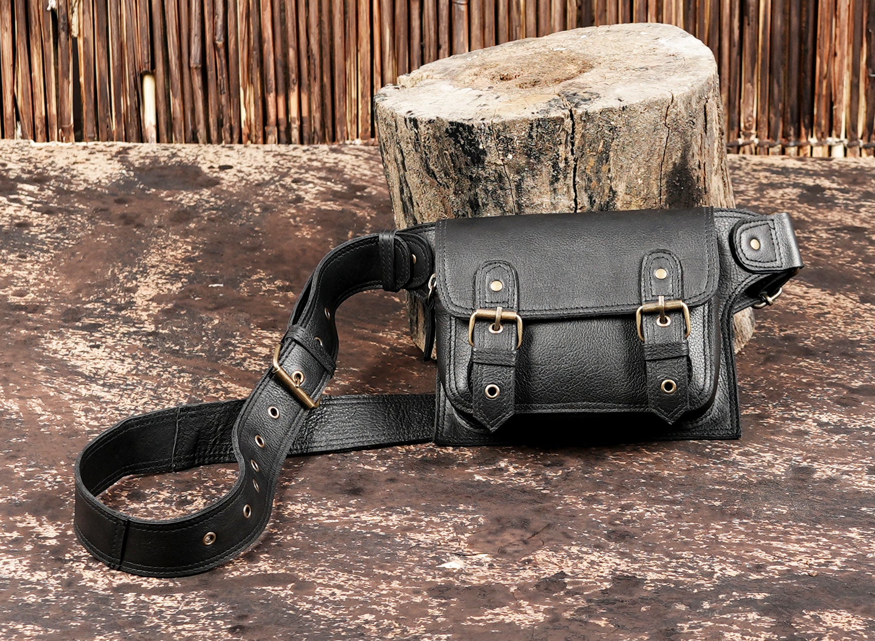 "Crossbody or waist-wear leather belt bag with buckles"
