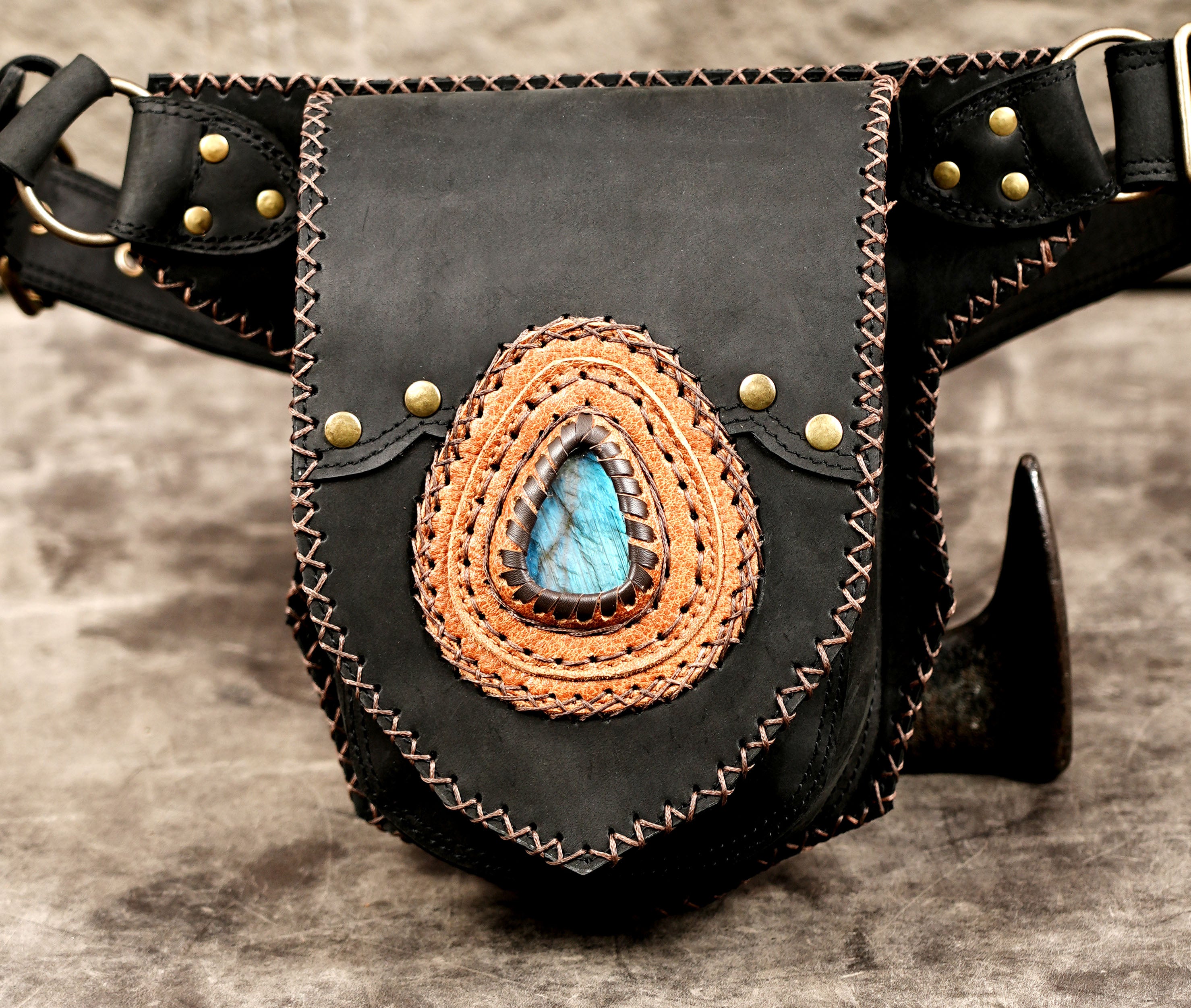 Artisan leather waist pouch with blue stone decoration