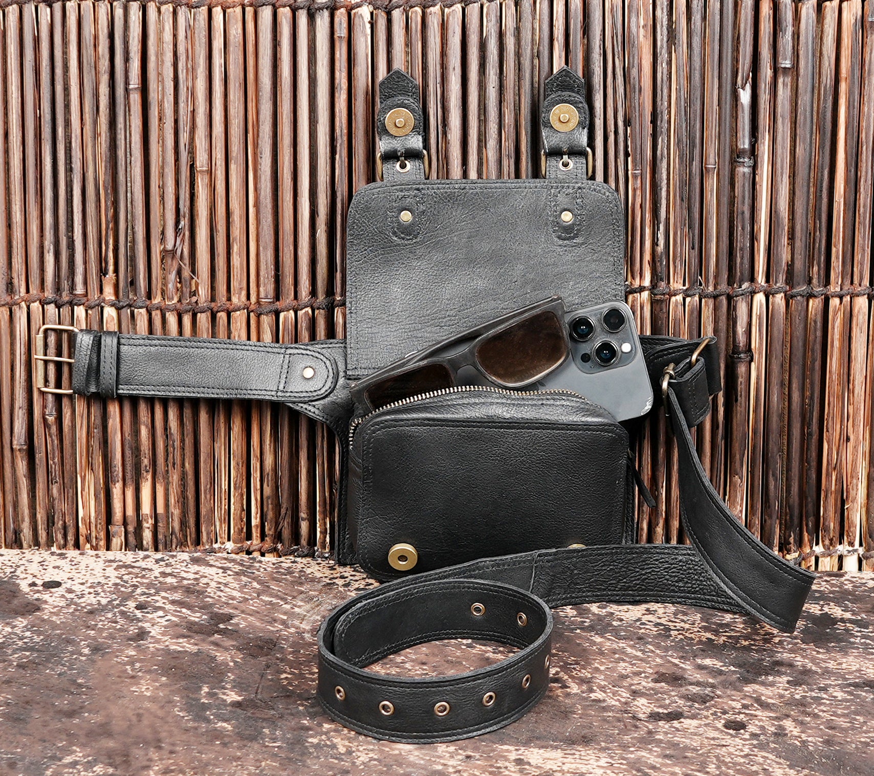 "Leather waist belt bag with adjustable buckle strap"