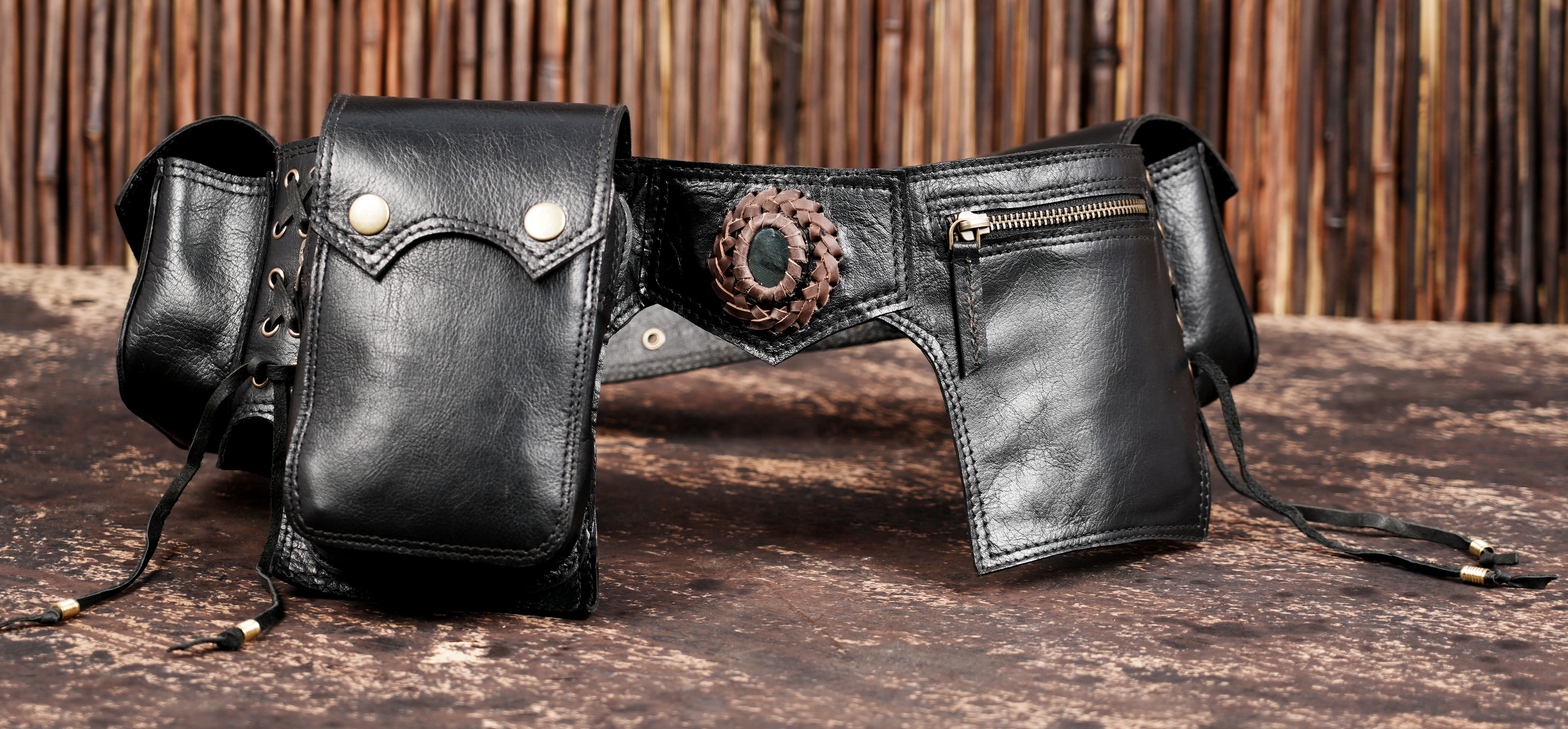 Black leather travel waist belt with stone centerpiece