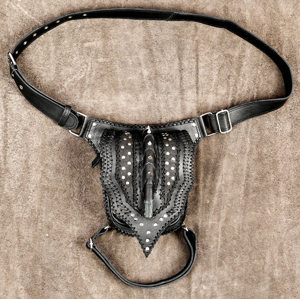 Dark villain style leather thigh holster with spike