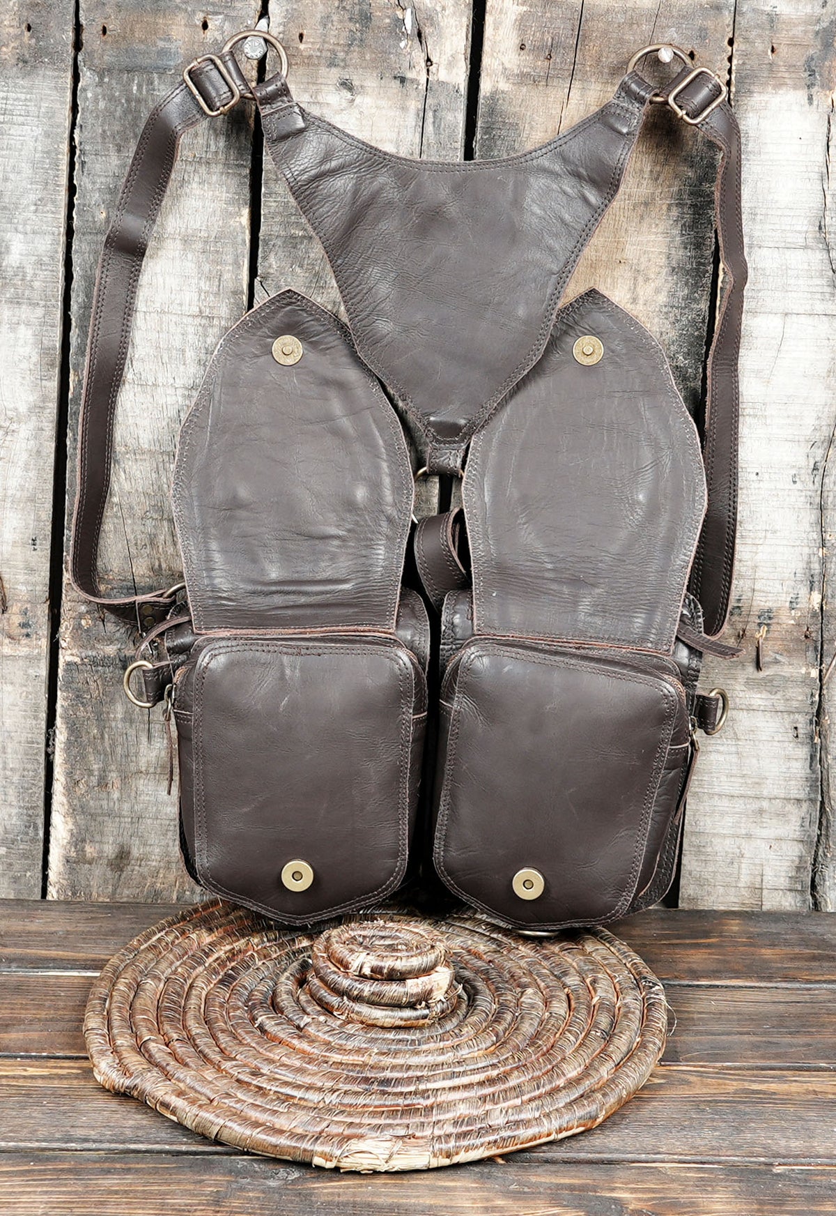 Artisan made leather harness with two flap pockets and adjustable metal buckles