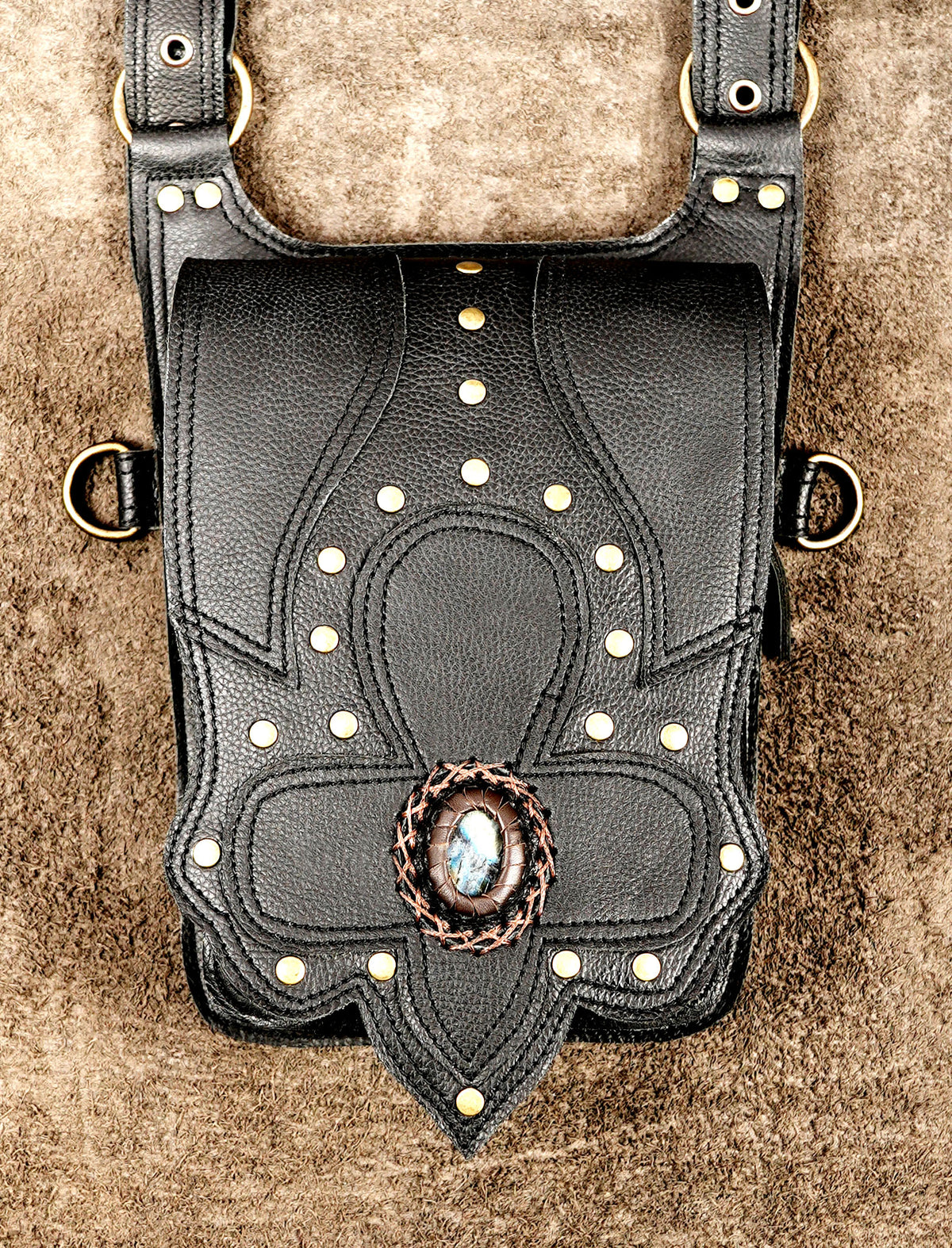 Black leather double pocket holster bag with adjustable straps and brass hardware