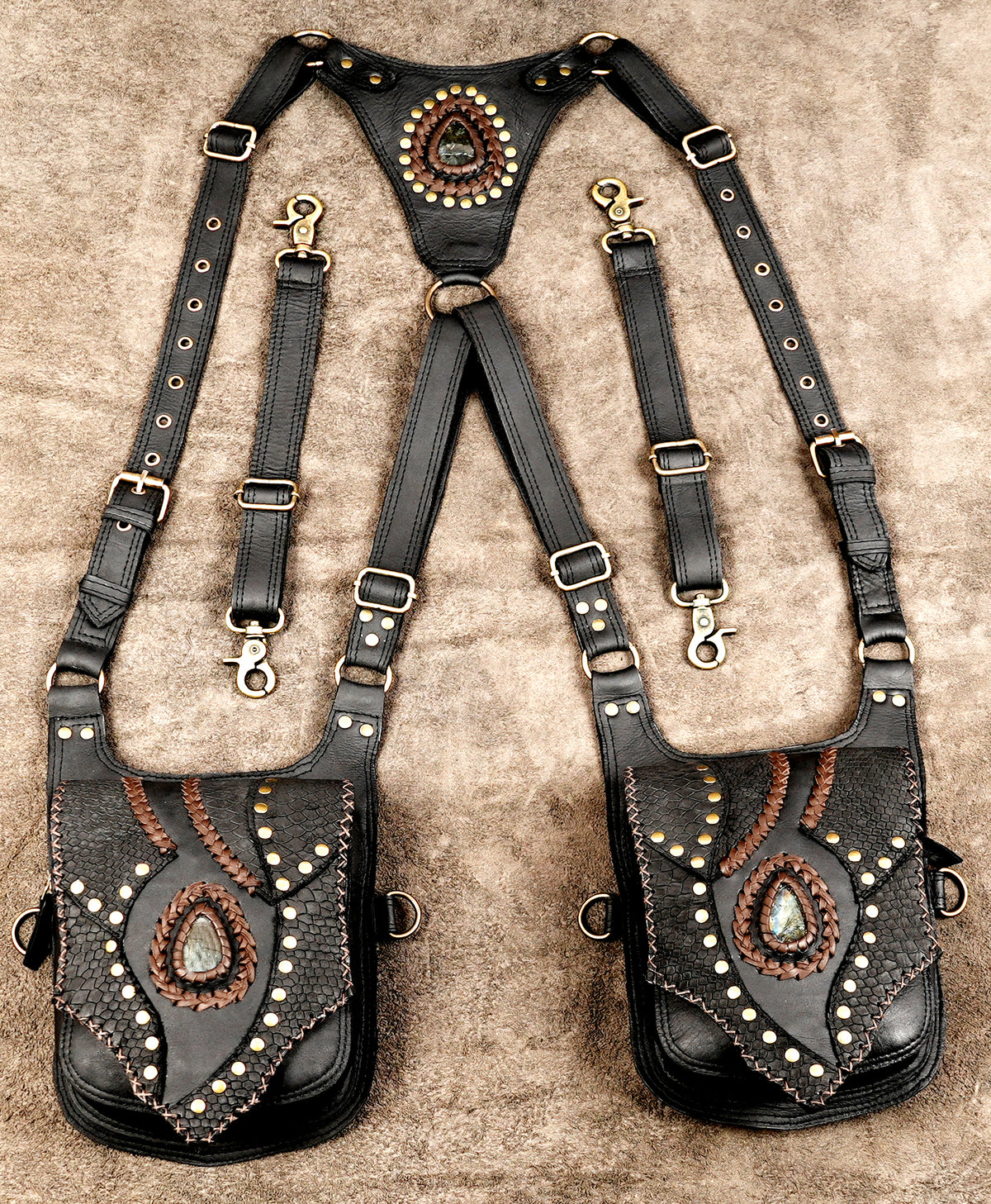 Artisan black leather harness with two utility pockets and adjustable buckle straps