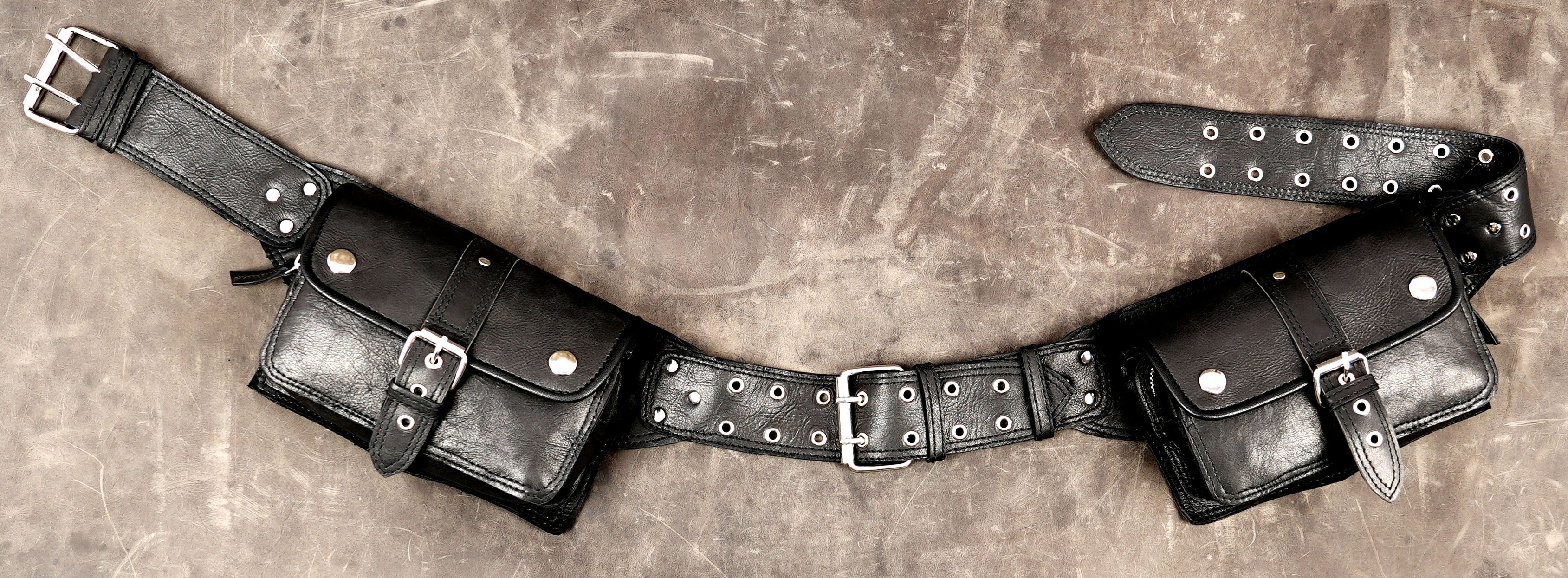 Explorer style leather belt with satchel pocket design