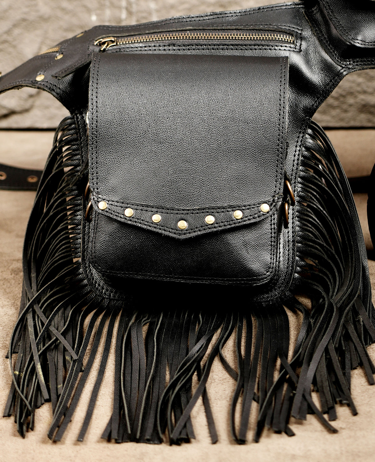 Festival fashion leather belt bag flat lay