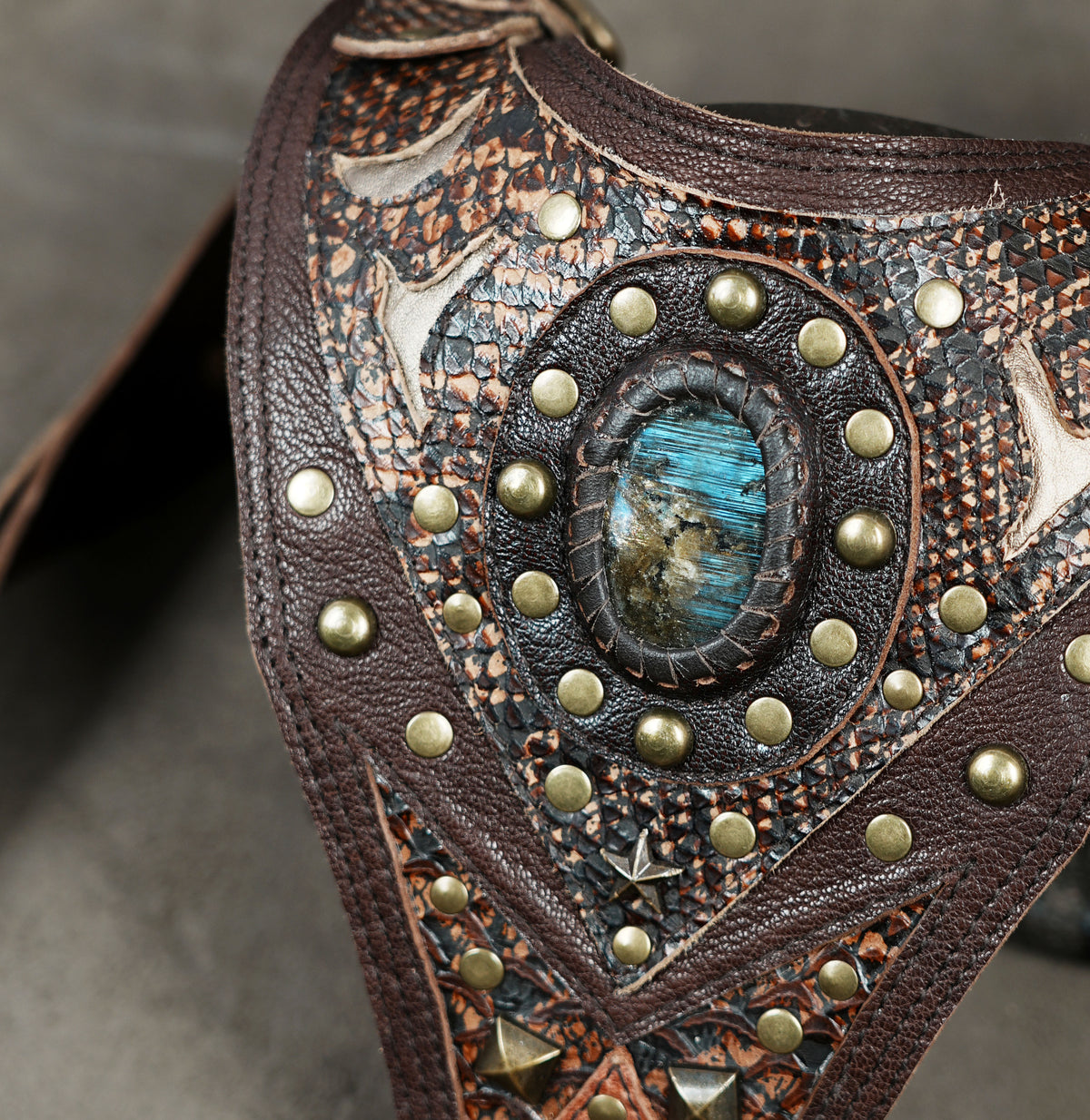 Handmade leather shoulder holster set for Burning Man, rave outfits, and alternative fashion.