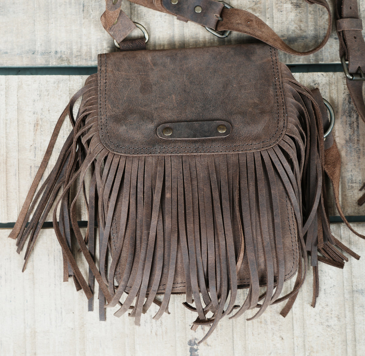 Brown Leather Chest Harness Bag with Fringe Pockets and Studded Yoke