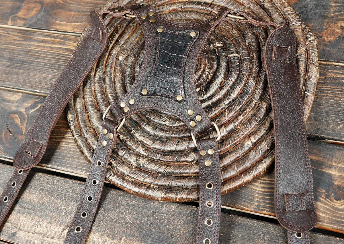 Festival wear brown leather thigh holster belt with two spacious storage pouches.